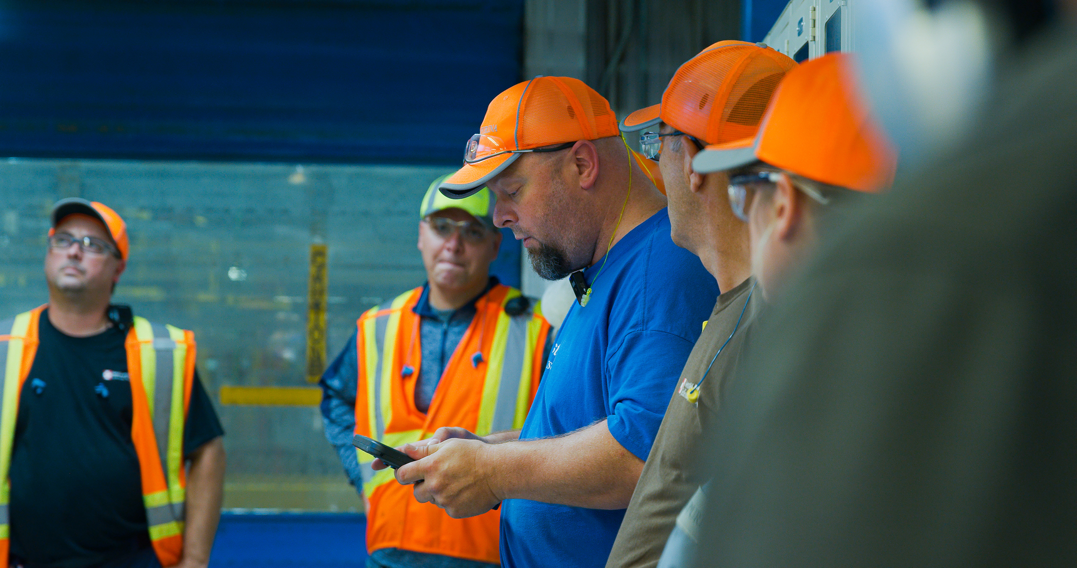An operator giving instructions to his team.