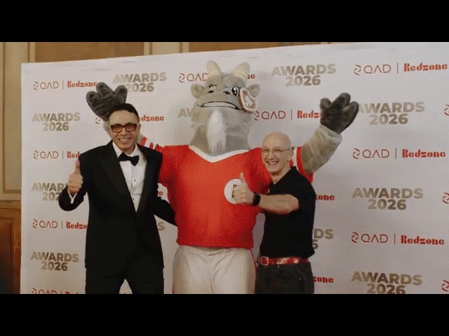 Gary the Goat with Sanjay, CEO of QAD | Redzone and another individual