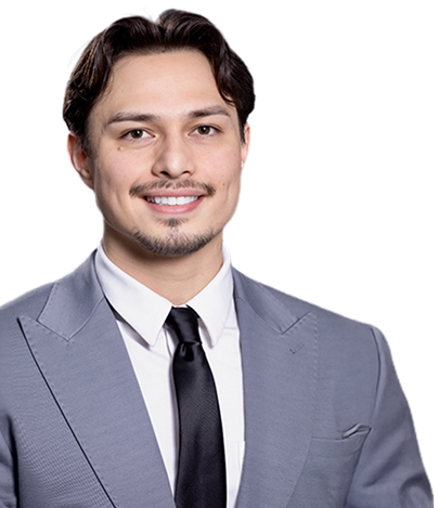 Smiling man with short hair wearing a dark button-up shirt with arms crossed.