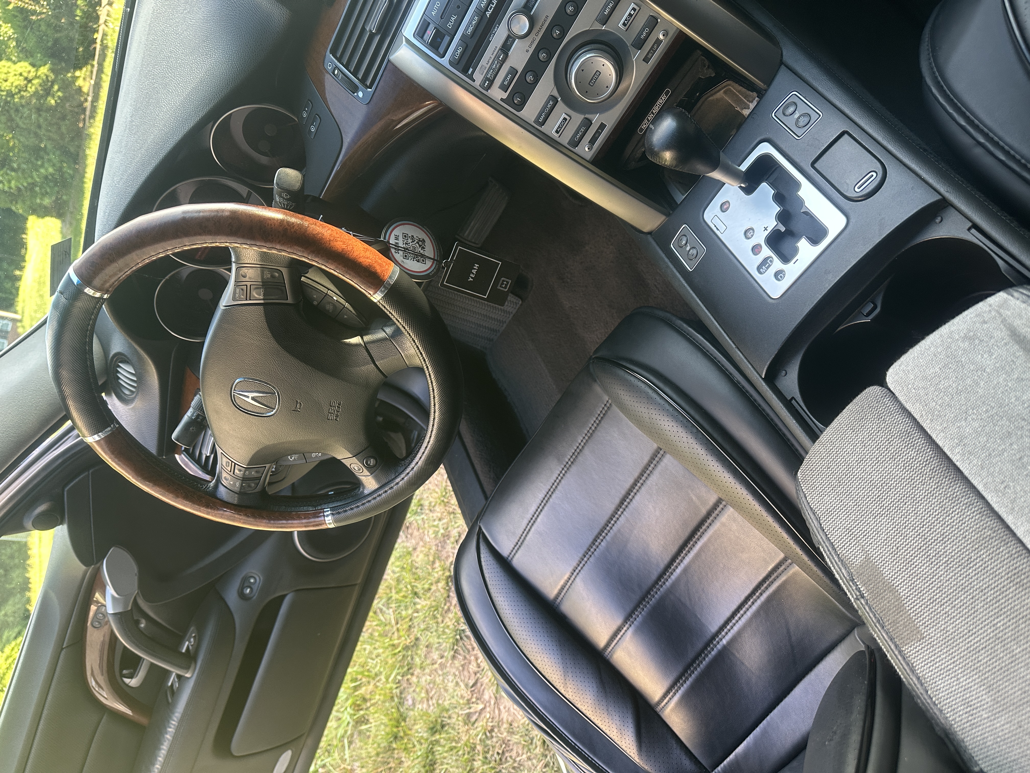 Clean car interior after jxl mobile detailing service in Chester VA with vacuumed seats and floors and wiped down center console