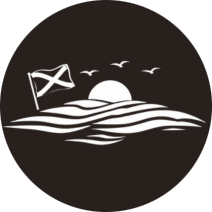 Sailboat with flag drifting on wavy ocean under sunset