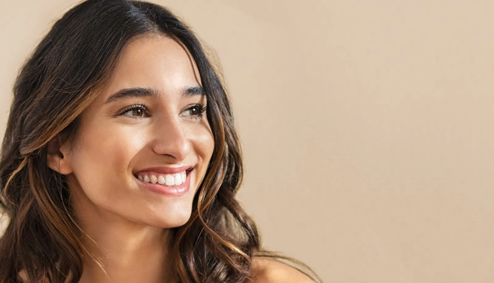 woman with brown hair smiling
