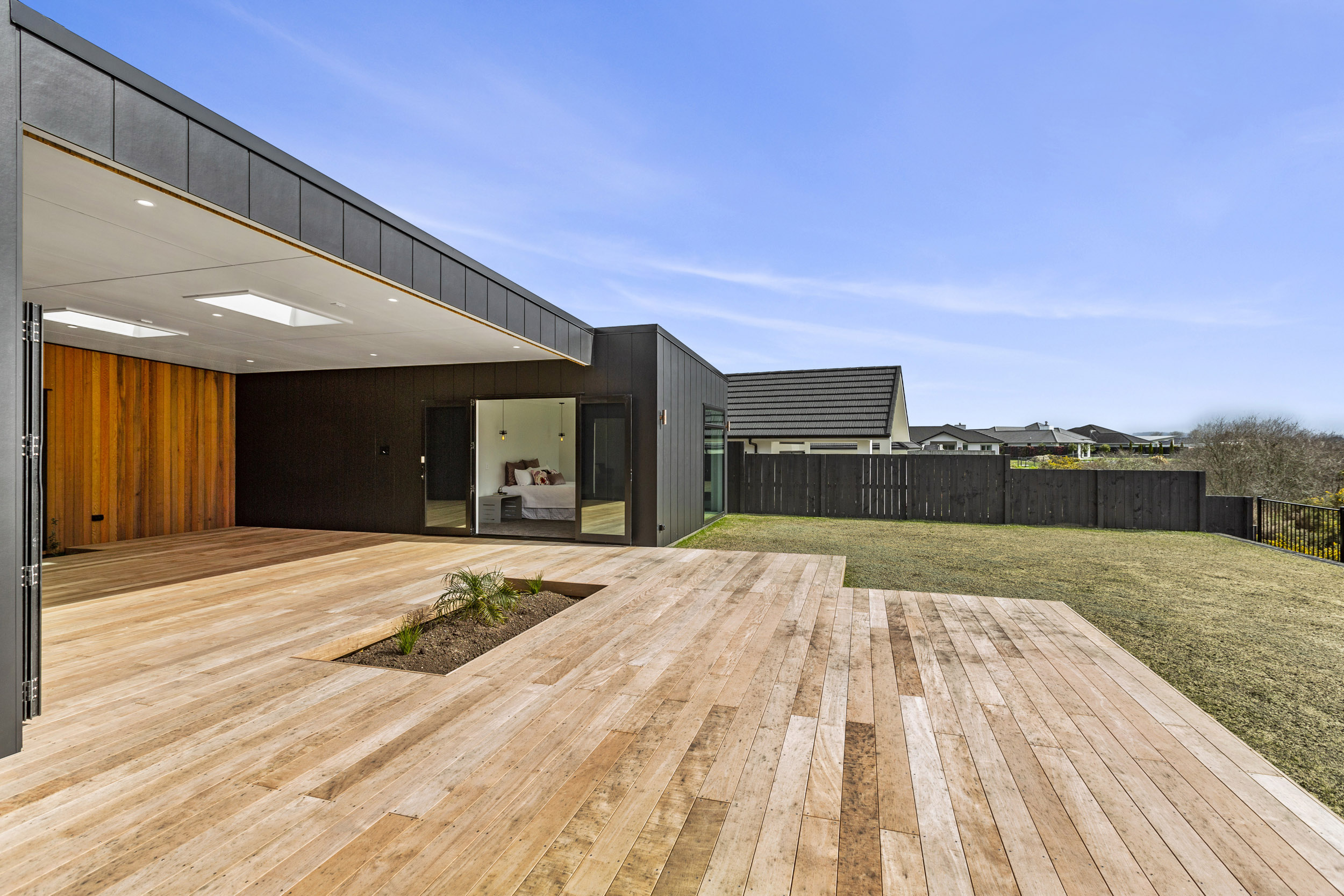 The rear deck of a newly constructed home