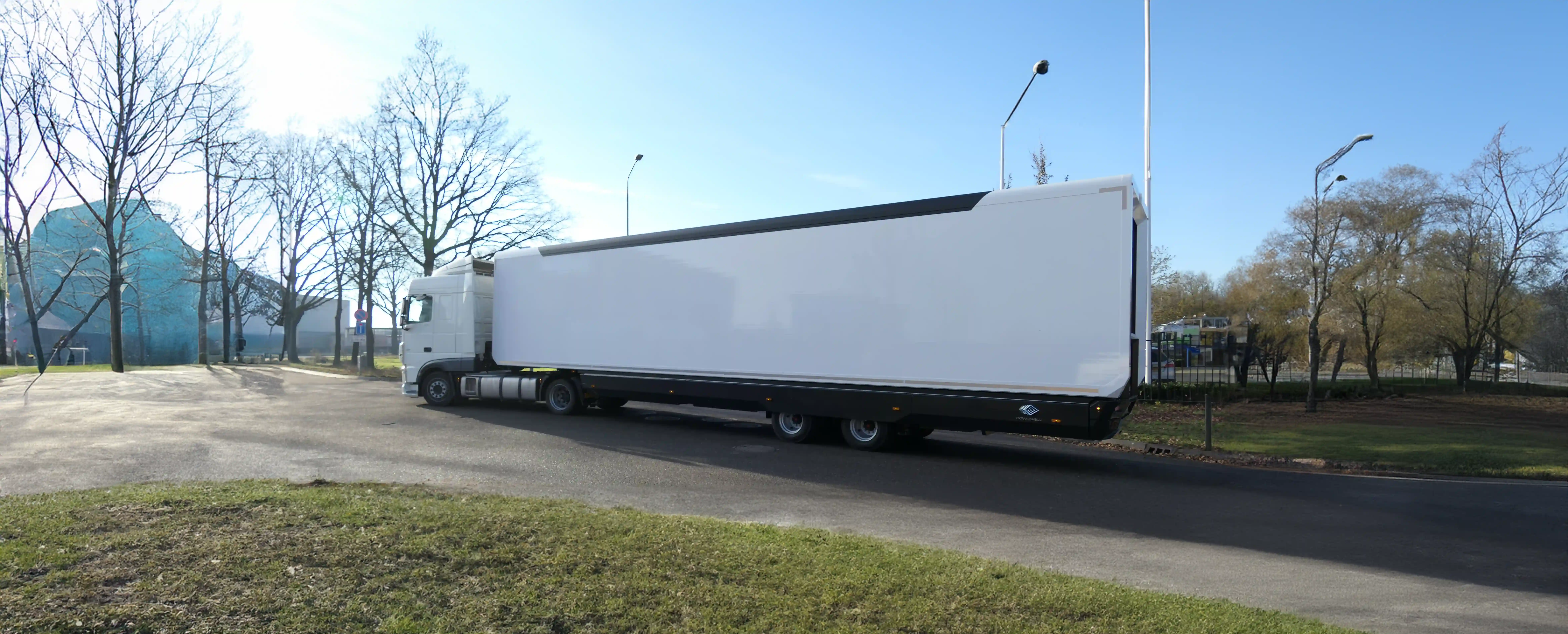 A movie set trailer going to a new place to create a movie