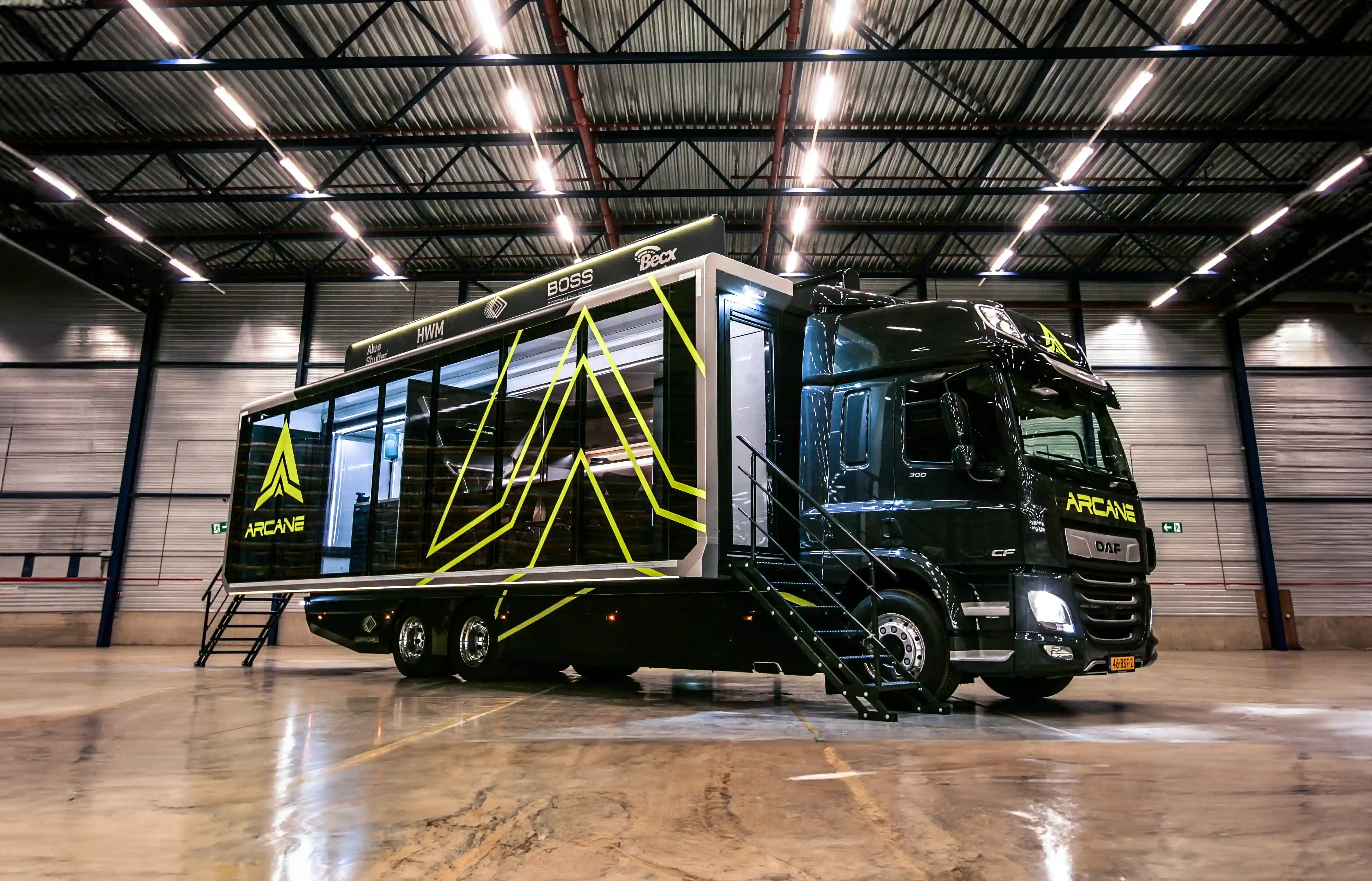 Black DAF Rally Truck Front View with ARCANE Logo and Expandable 30 ft Container
