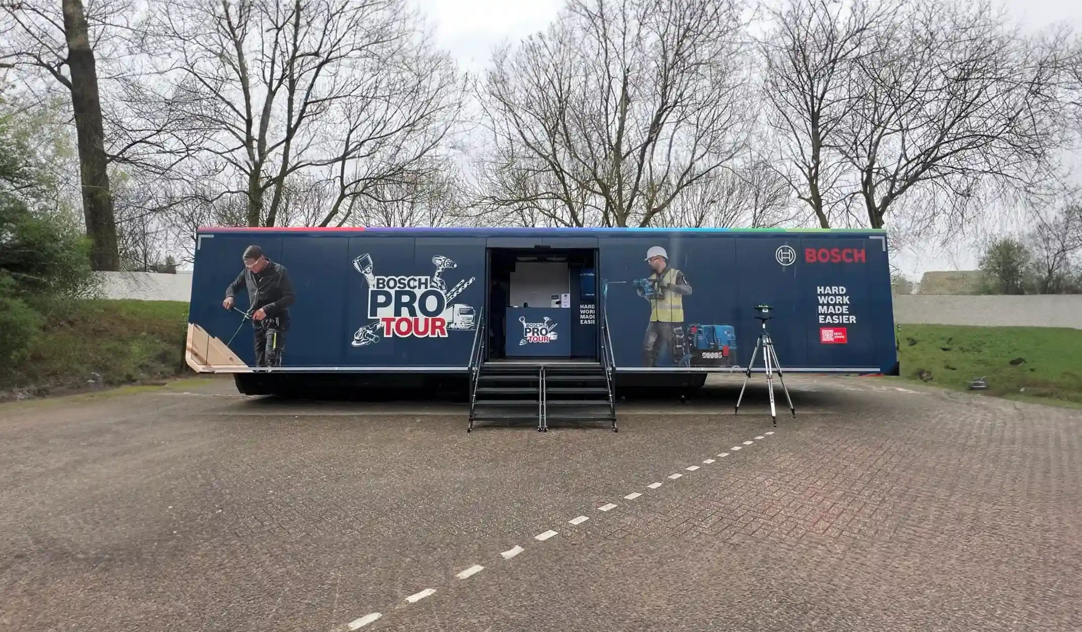 Exterior view of a closed mobile pop-up space located on near business companies.