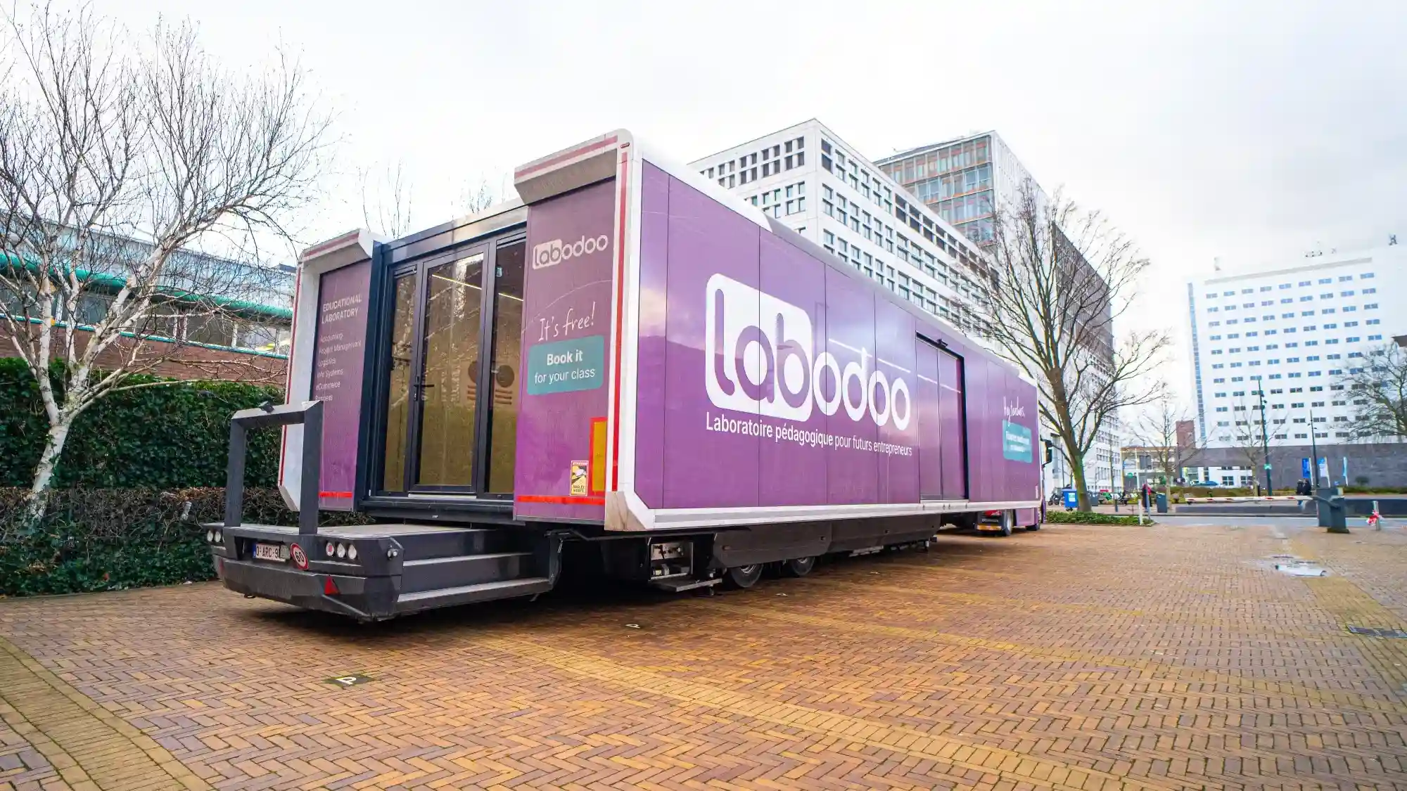 Pod 30ft model parked near a school for STEM outreach