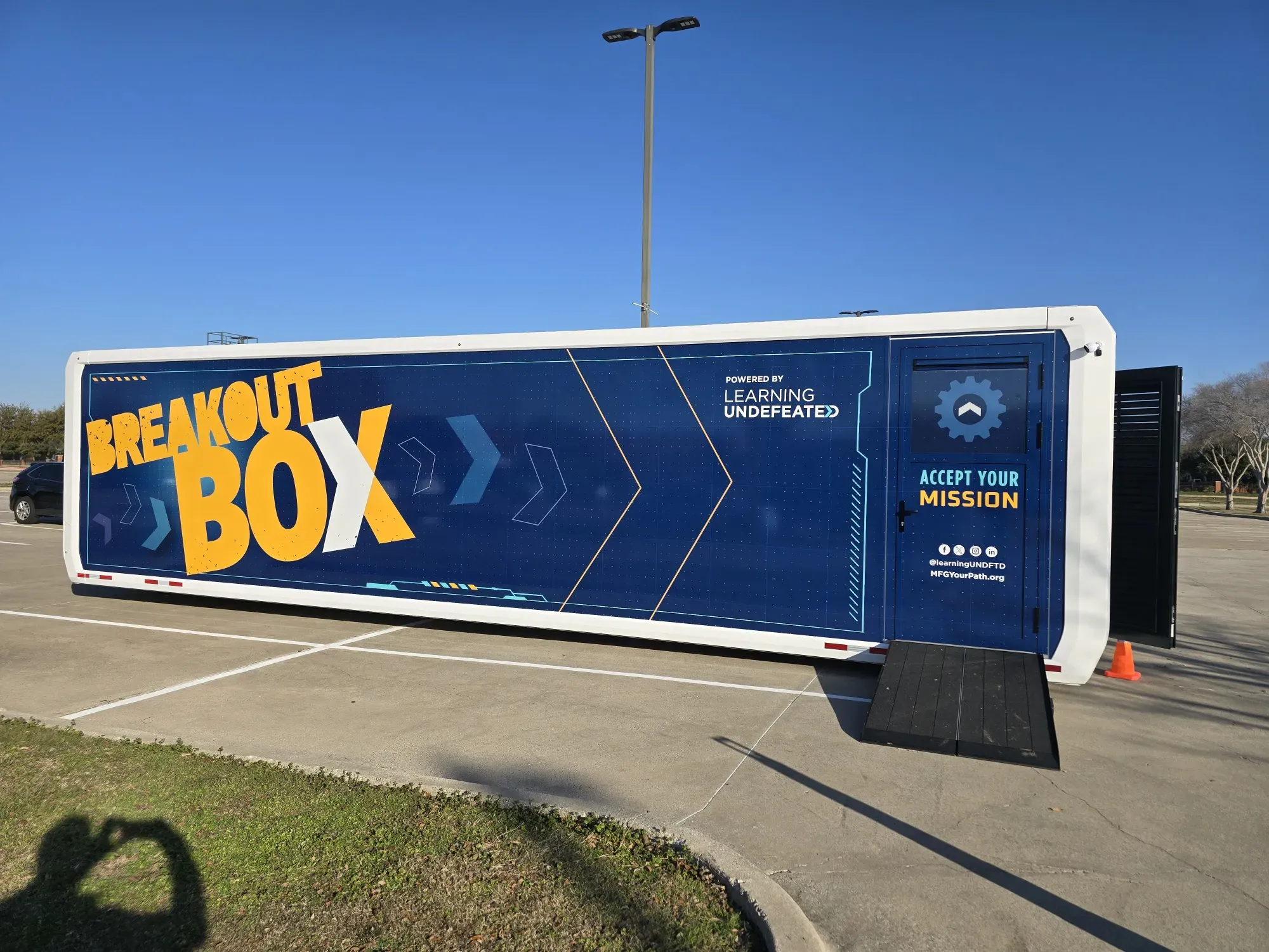 Expandable Mobile STEM Lab Trailer parked at a school, ready for hands-on STEM education.