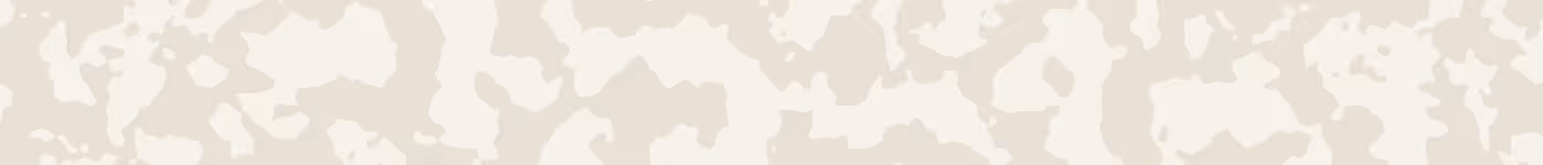 Beige and off-white abstract camouflage pattern with irregular organic shapes.