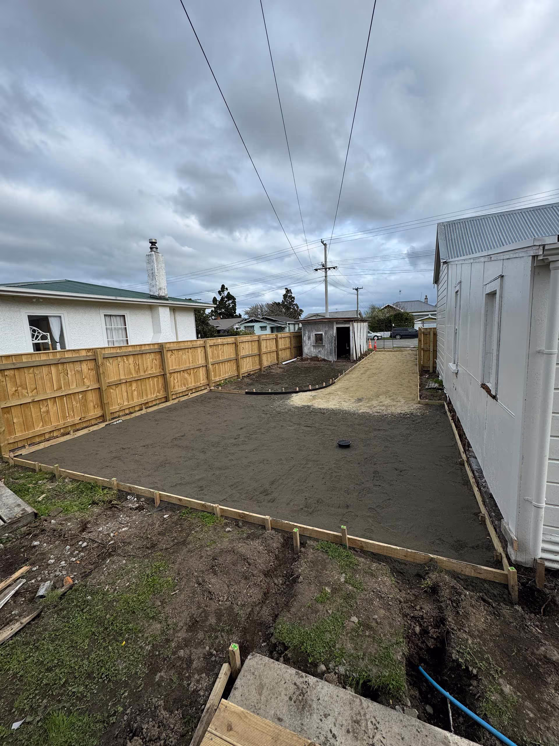 Fleetline Diggers in Whanganui clearing section and preparing ground for concrete driveway and building pad