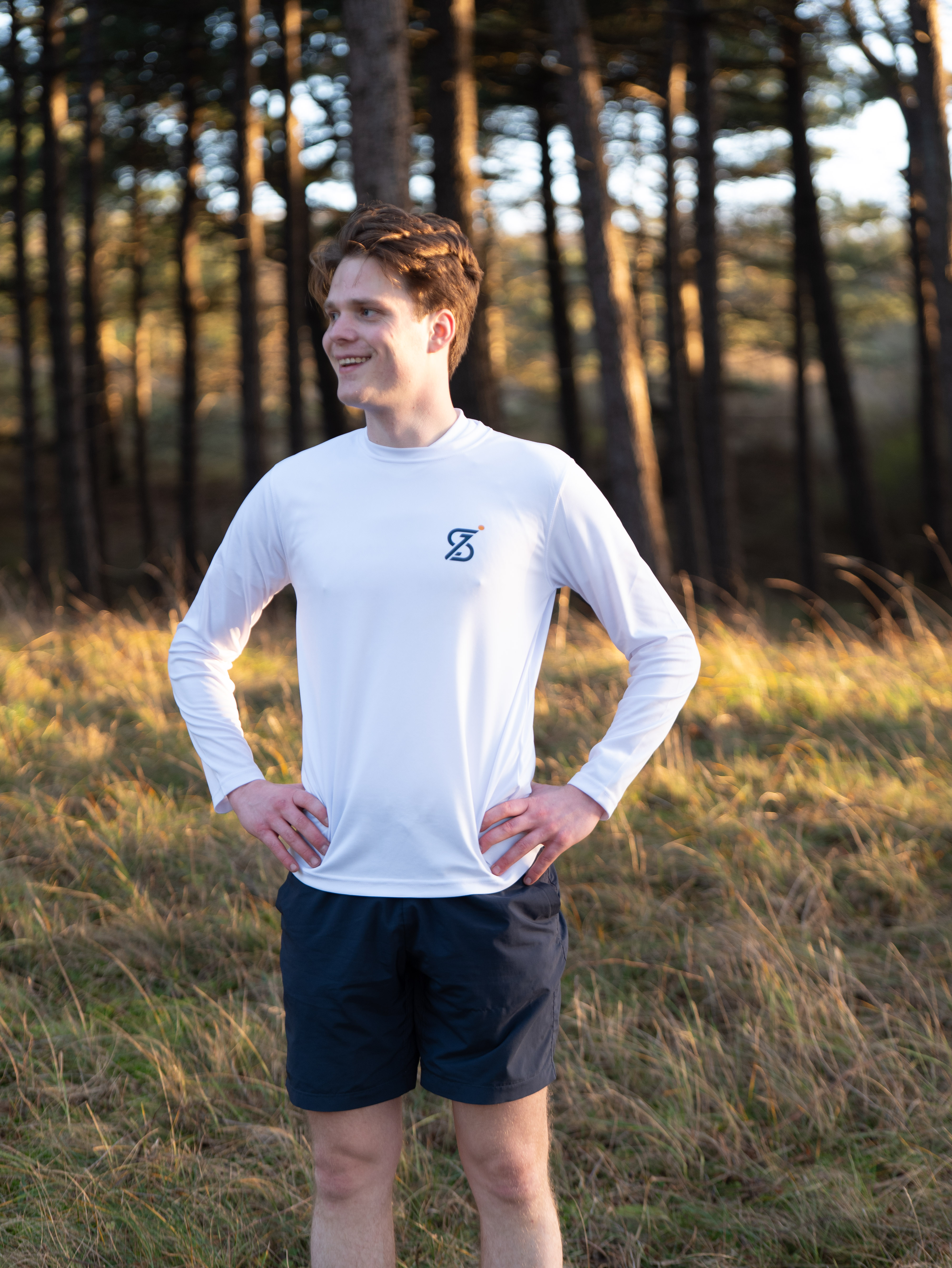 A portrait of SCIPIO standing in the woods