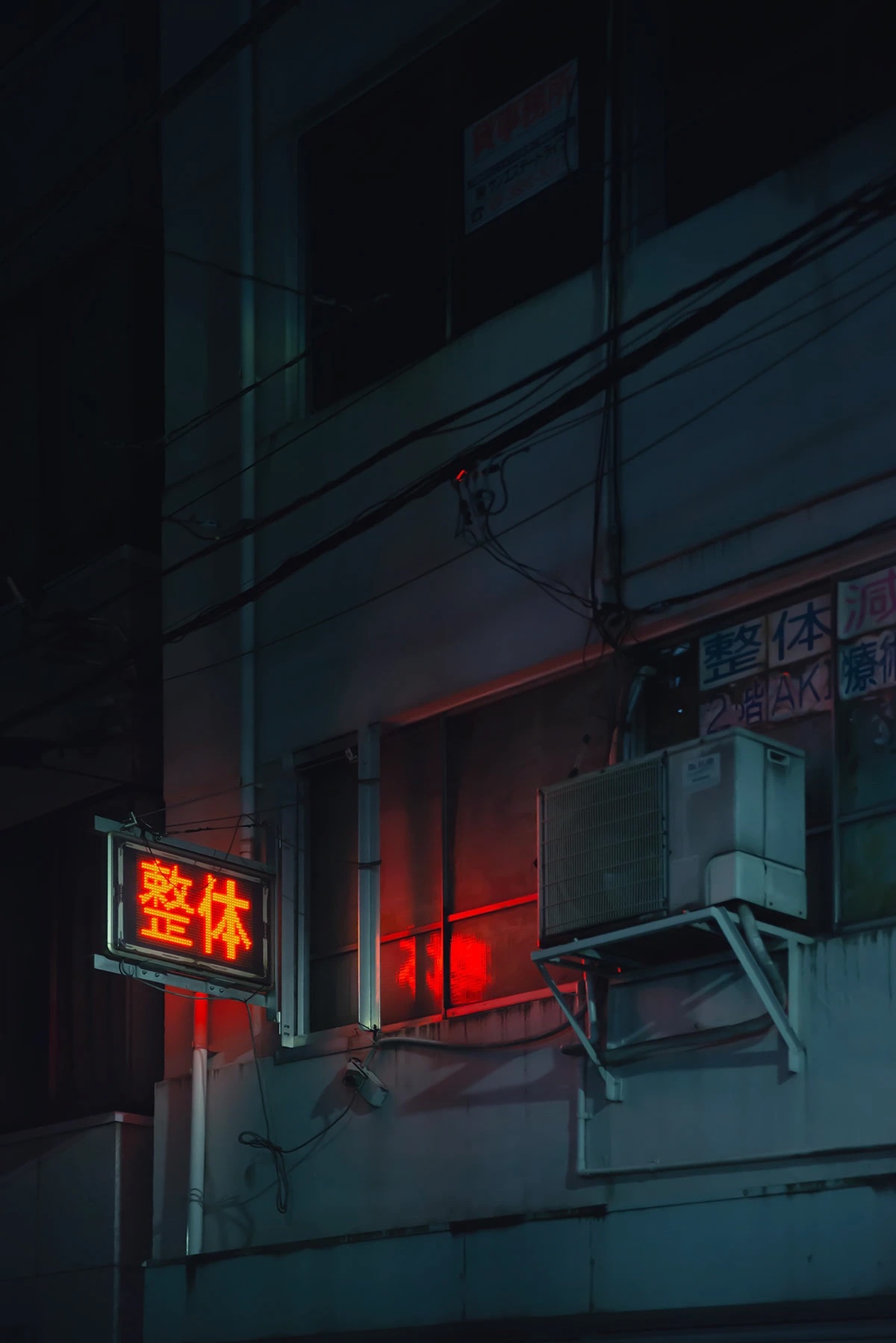 Dimly lit exterior of a building at night with a red illuminated Japanese sign and an air conditioning unit mounted on the wall.