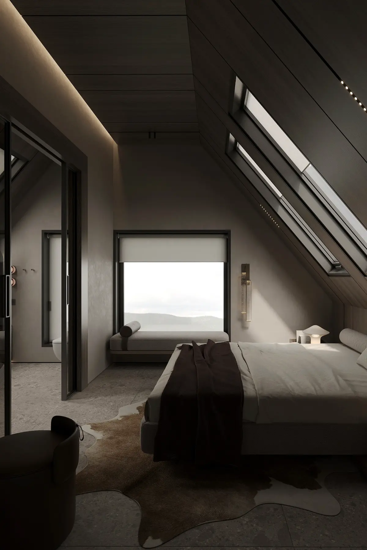 Modern bedroom with slanted ceiling skylights, a large bed with a dark throw, window bench, and textured floor rug.