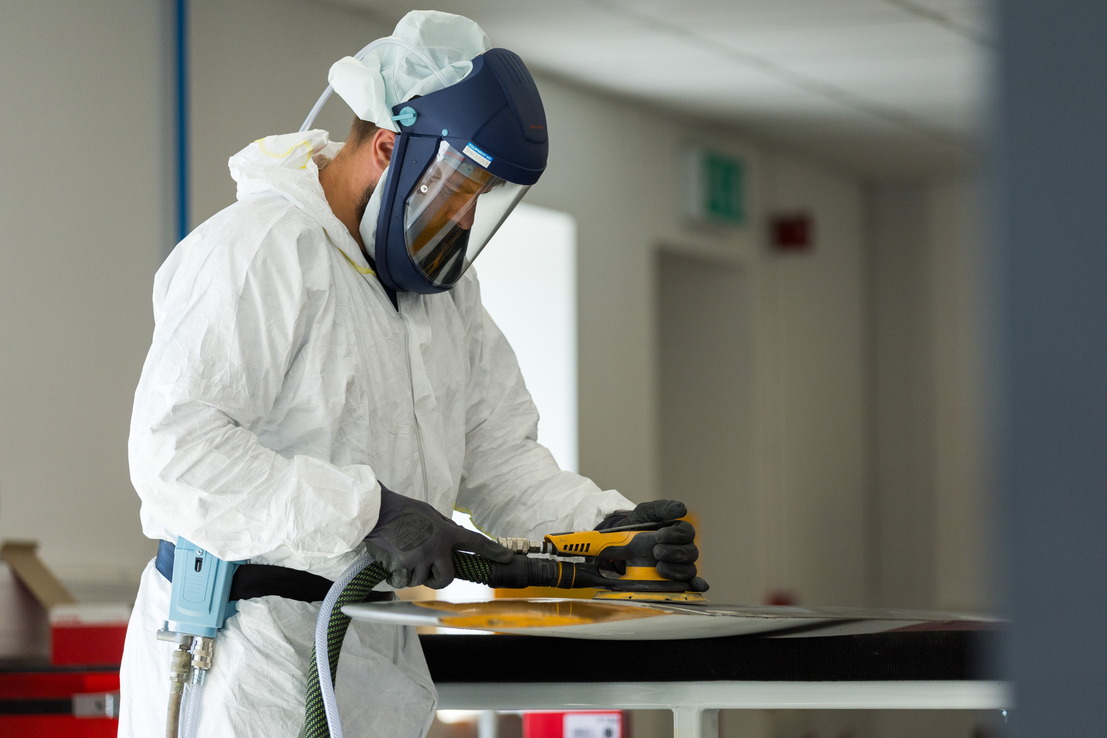 image of maintenance crew working on aircraft