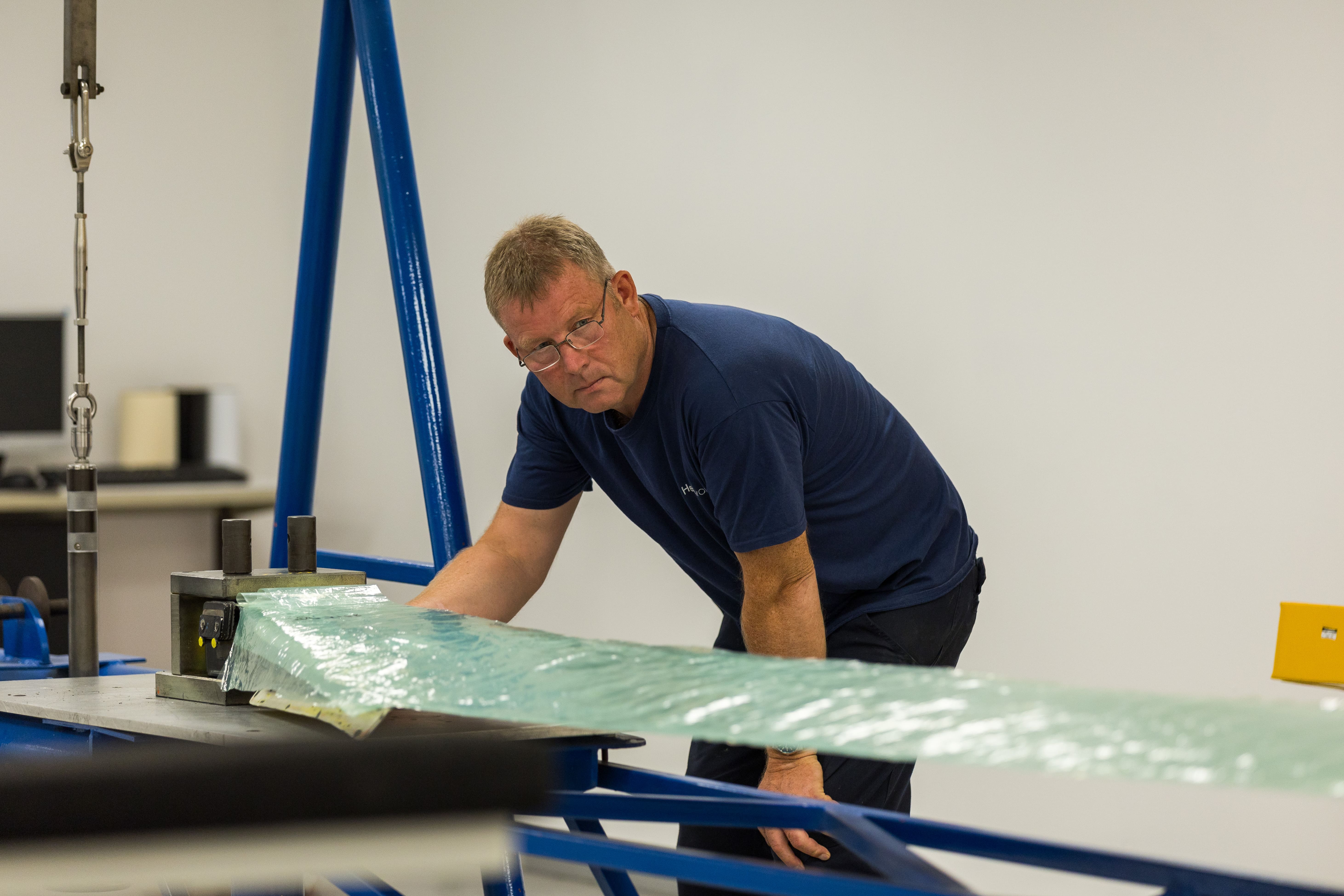 image of maintenance crew working on aircraft