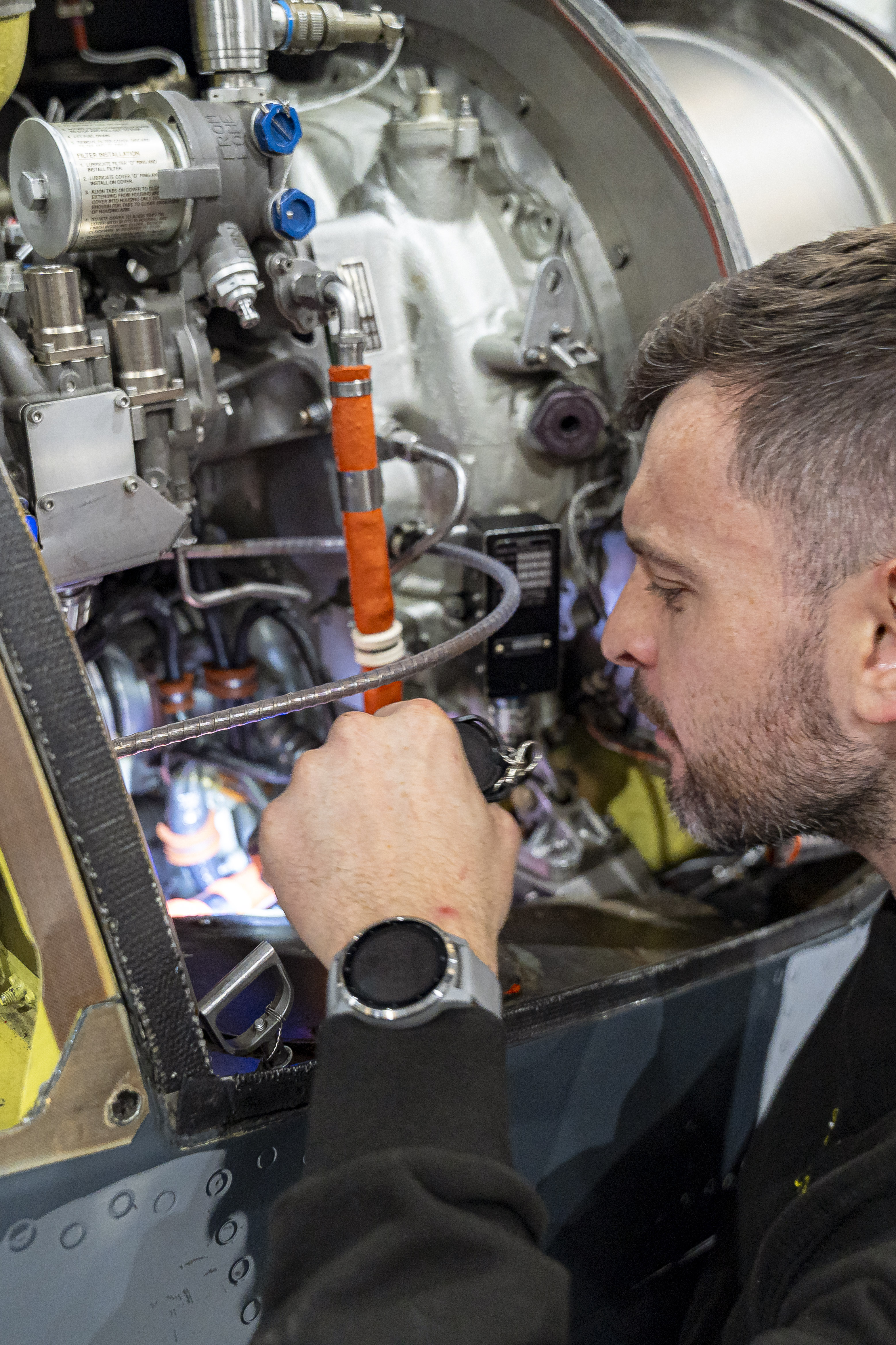 image of maintenance crew working on aircraft