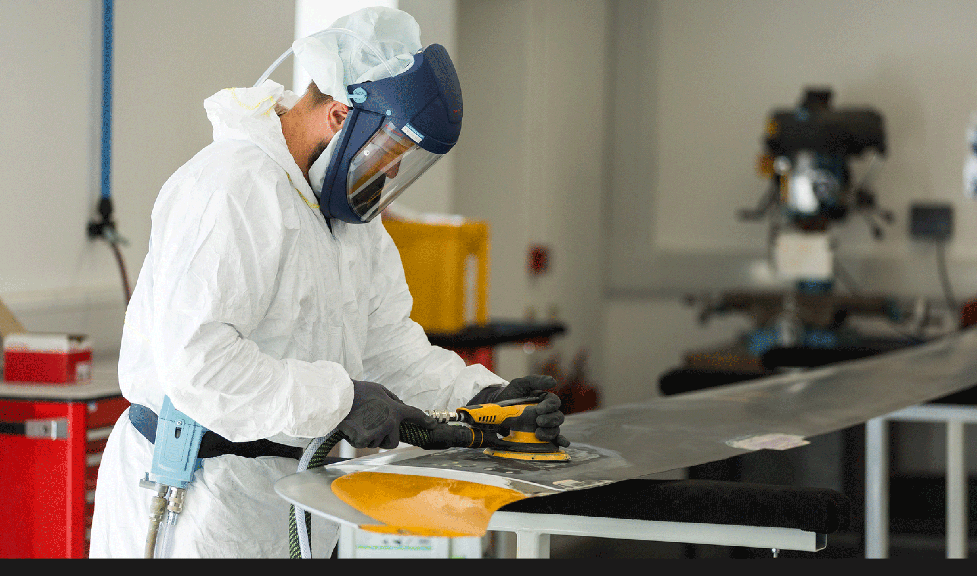 image of maintenance crew working on aircraft