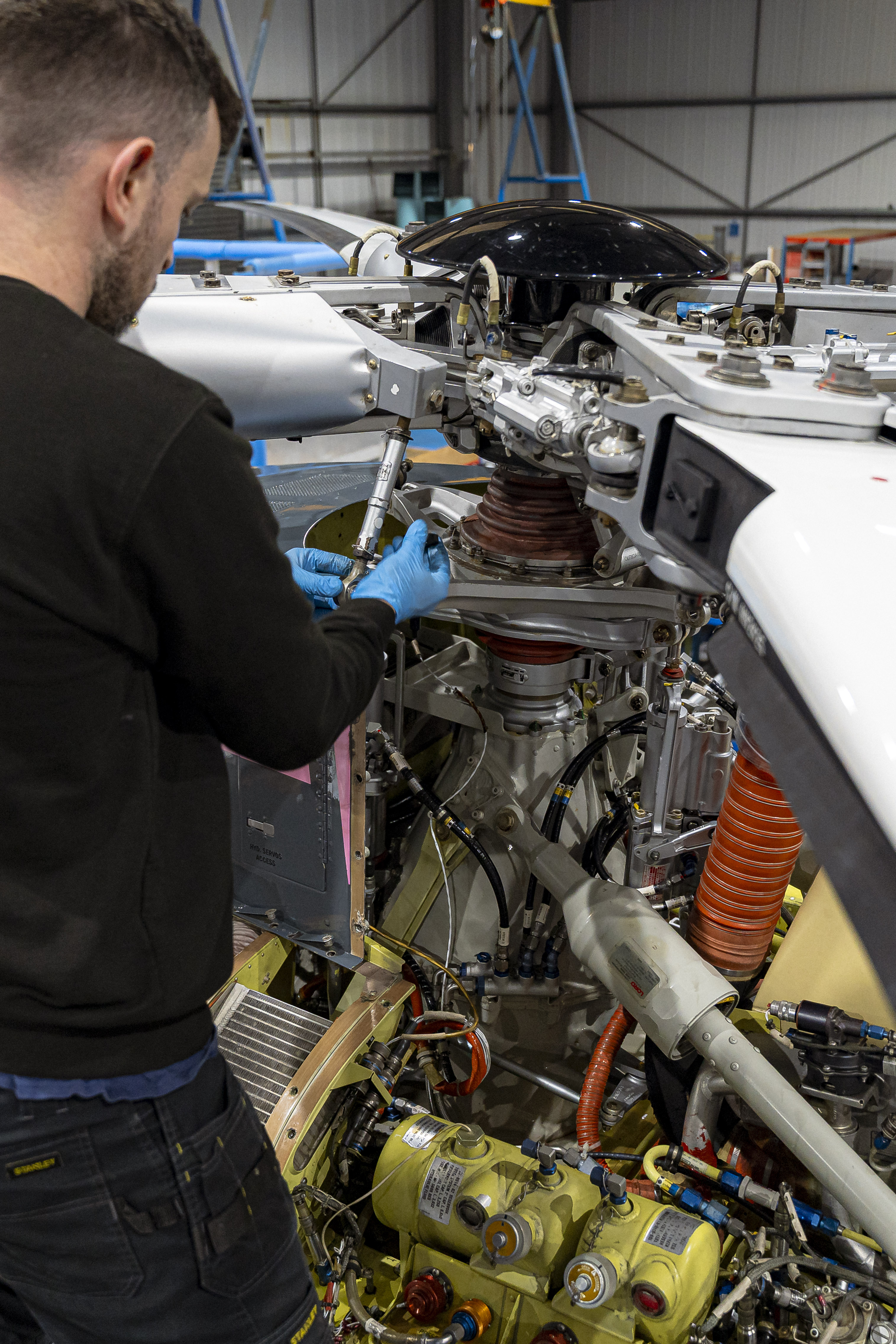 image of maintenance crew working on aircraft