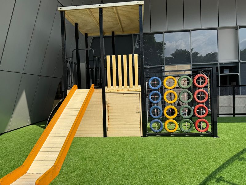 The outdoor play area at Agora, Fragrance Empire Building
