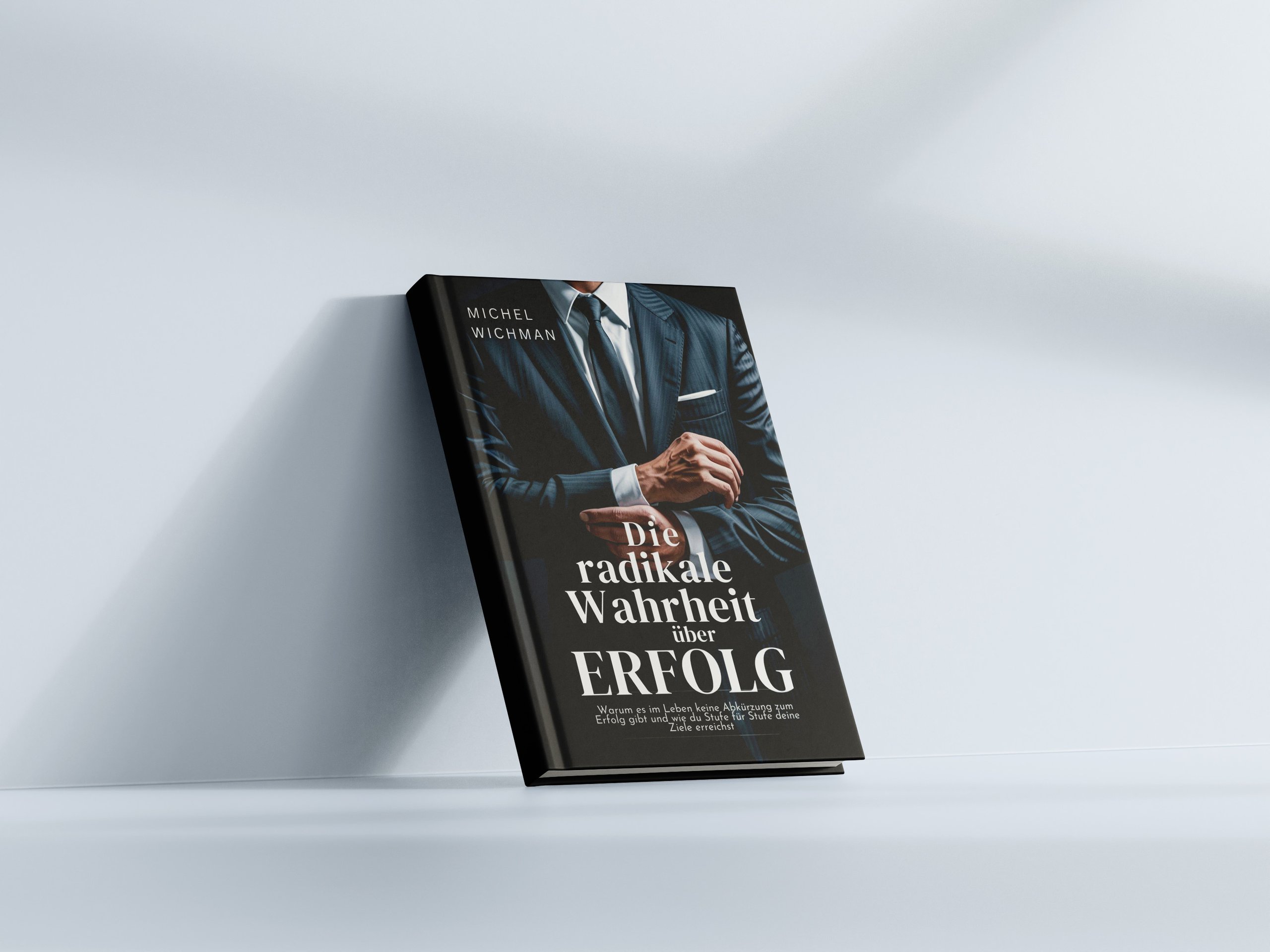 Buch mit dem Titel 'Die radikale Wahrheit über ERFOLG' von Michel Wichman mit Bild eines Mannes im Anzug.