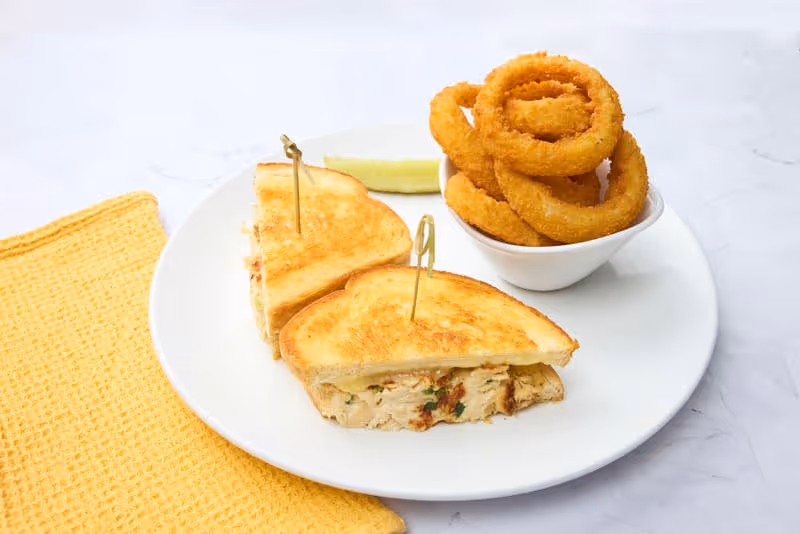 White albacore tuna salad with Jack cheese on grilled sourdough bread.