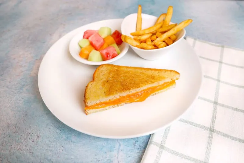 Hand-cracked eggs with your choice of two sides and a drink.