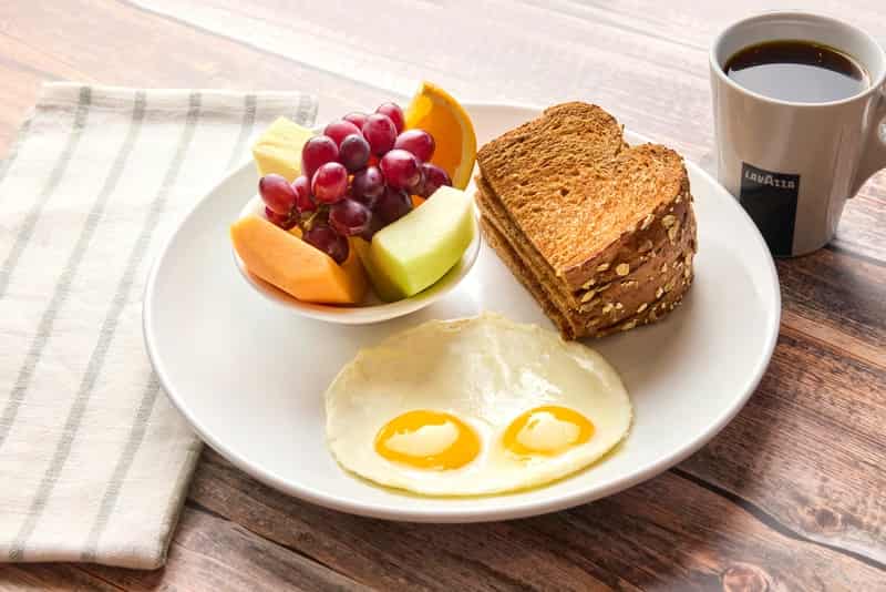 Eggs any style plus choice of side and bread.