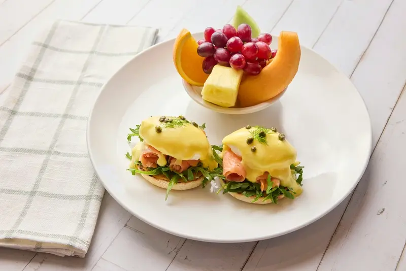 Smoked salmon, fresh dill, capers, arugula, poached eggs and hollandaise on a toasted English muffin.