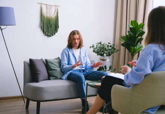 A man and a woman speaking