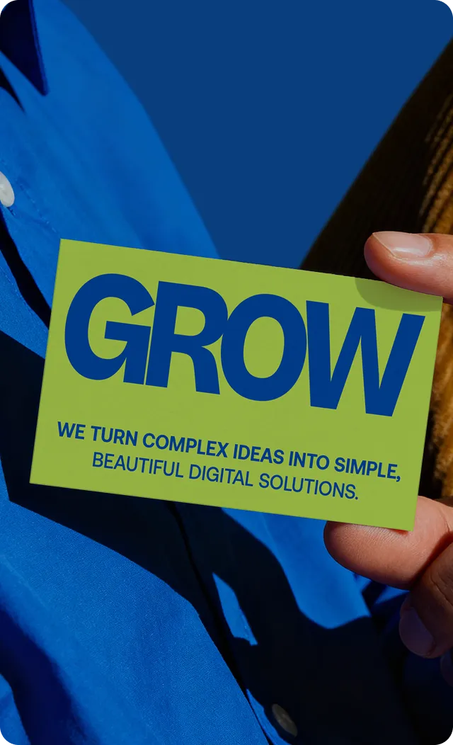 Hands holding a grow sign representing brand development and business growth