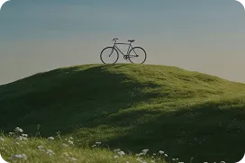 Smartphone displaying a bicycle graphic on a bold red background