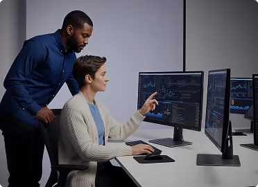 Fintech professionals analyzing digital financial technology solutions