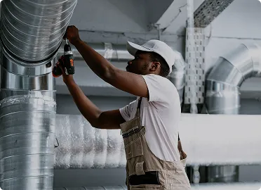 HVAC technician providing professional heating and cooling installation services