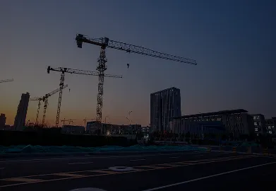 Real estate developer reviewing commercial property development plans and blueprints