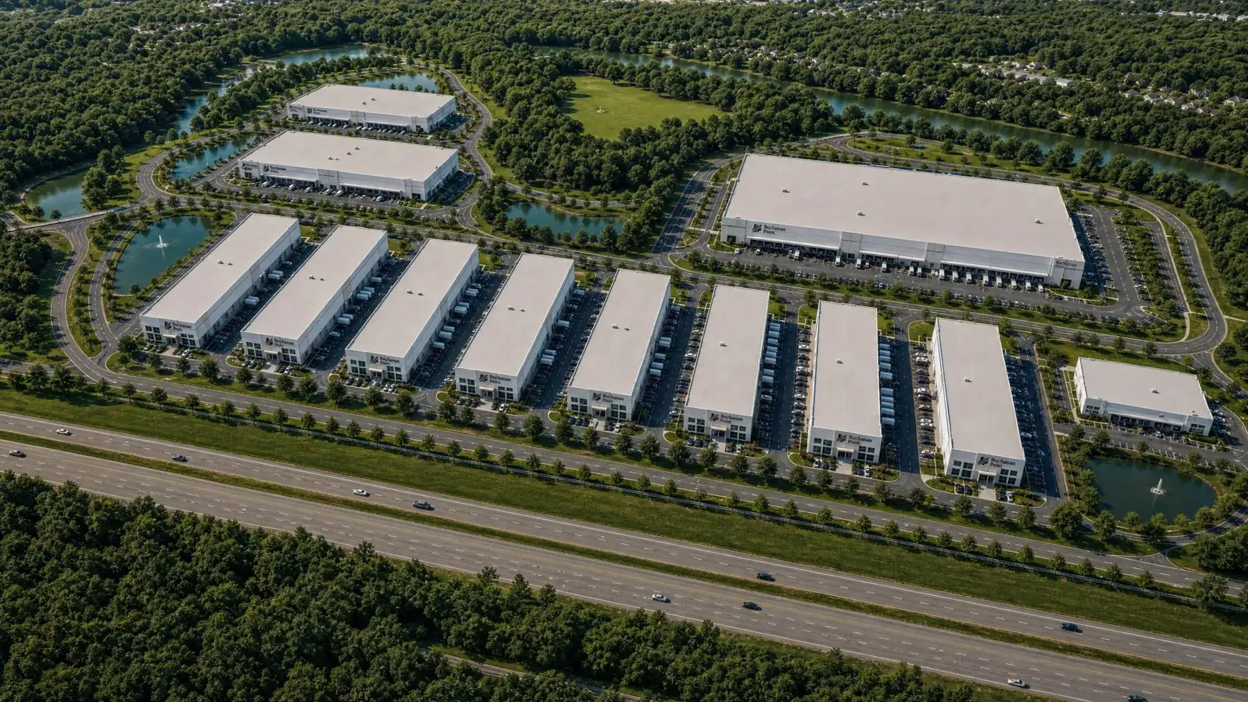 Aerial rendering of the Buchanan Point industrial park with two large buildings and rows of smaller warehouses