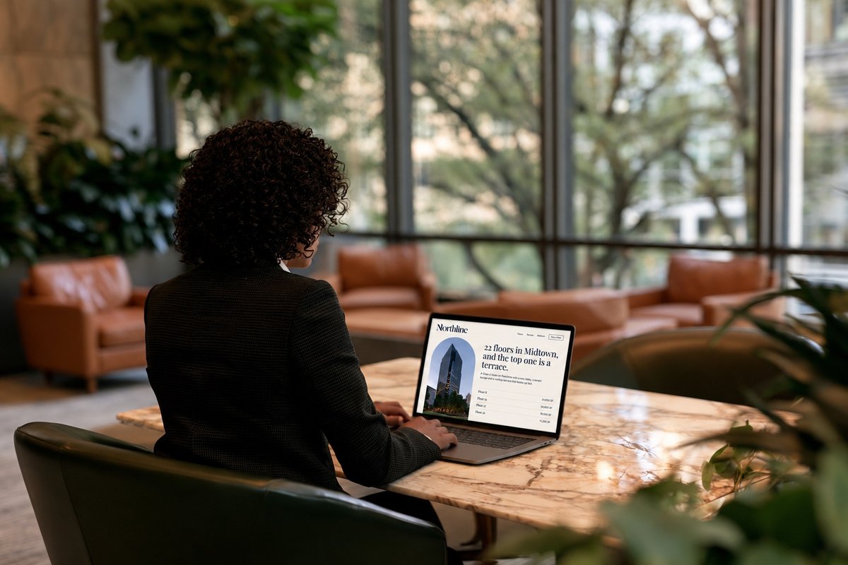 Woman browsing the Northline website on a laptop in a lounge