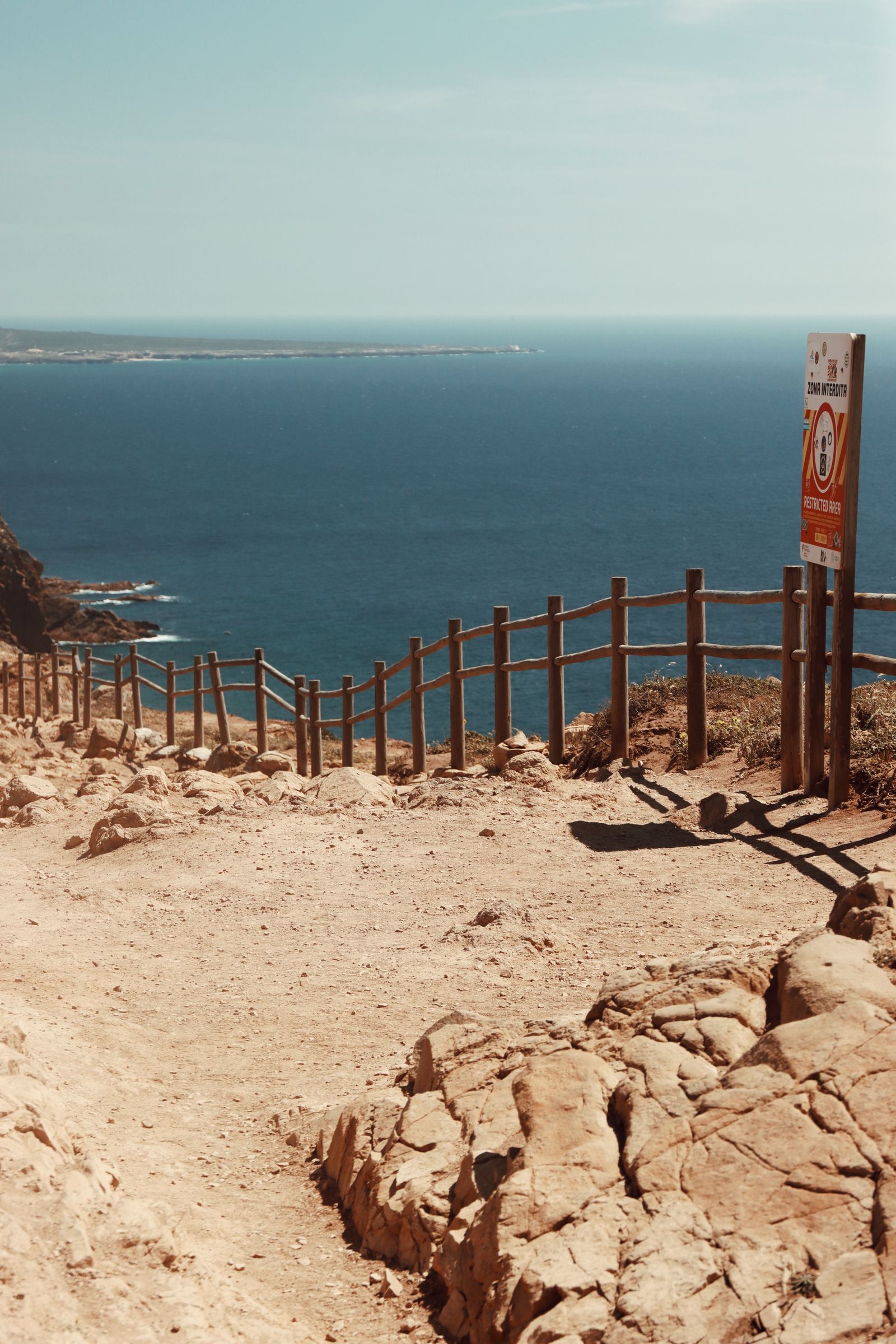 E-bike parked at a scenic Acadia coastal overlook with the Park Loop Road behind