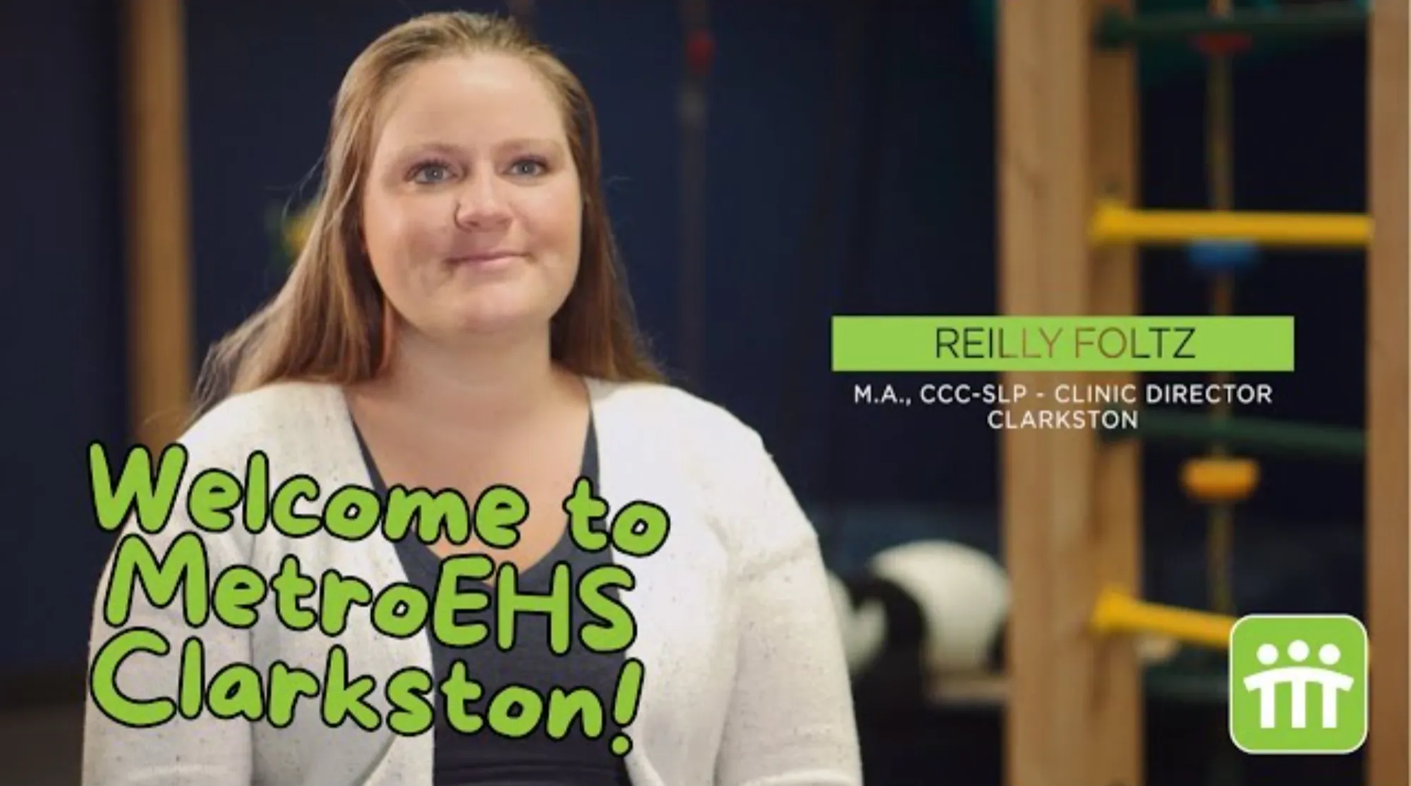 The clinic director sitting facing the camera talking about this MetroEHS clinic and what they do for children