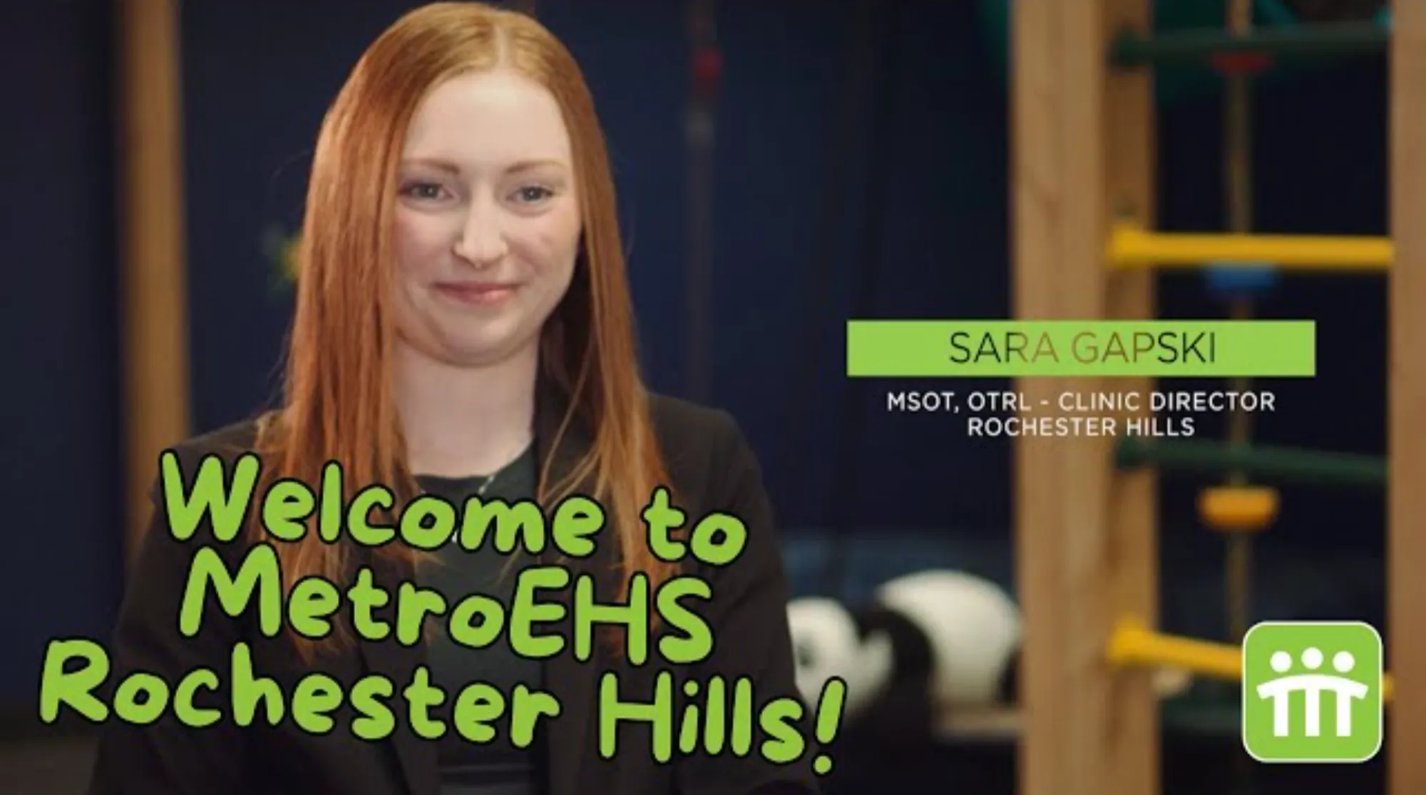 The clinic director sitting facing the camera talking about this MetroEHS clinic and what they do for children