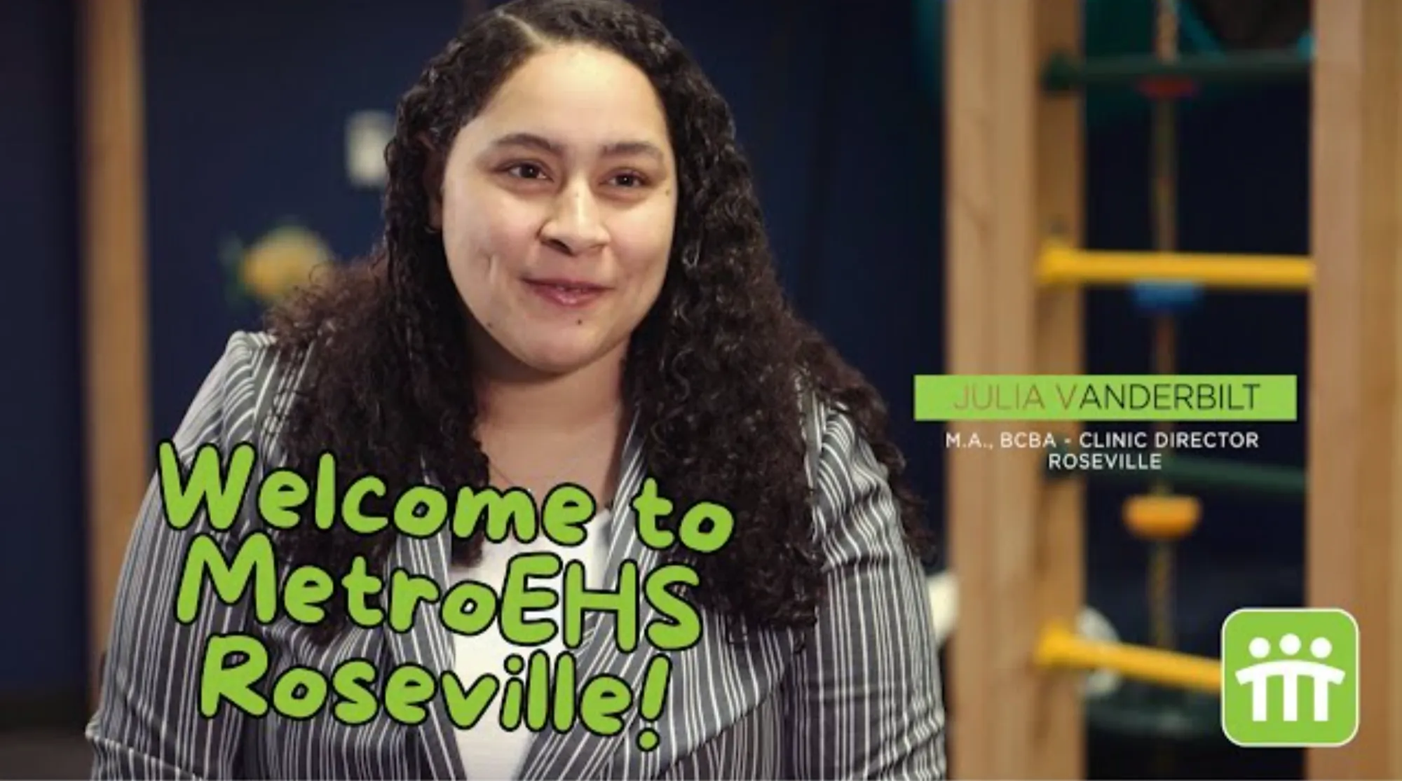 The clinic director sitting facing the camera talking about this MetroEHS clinic and what they do for children