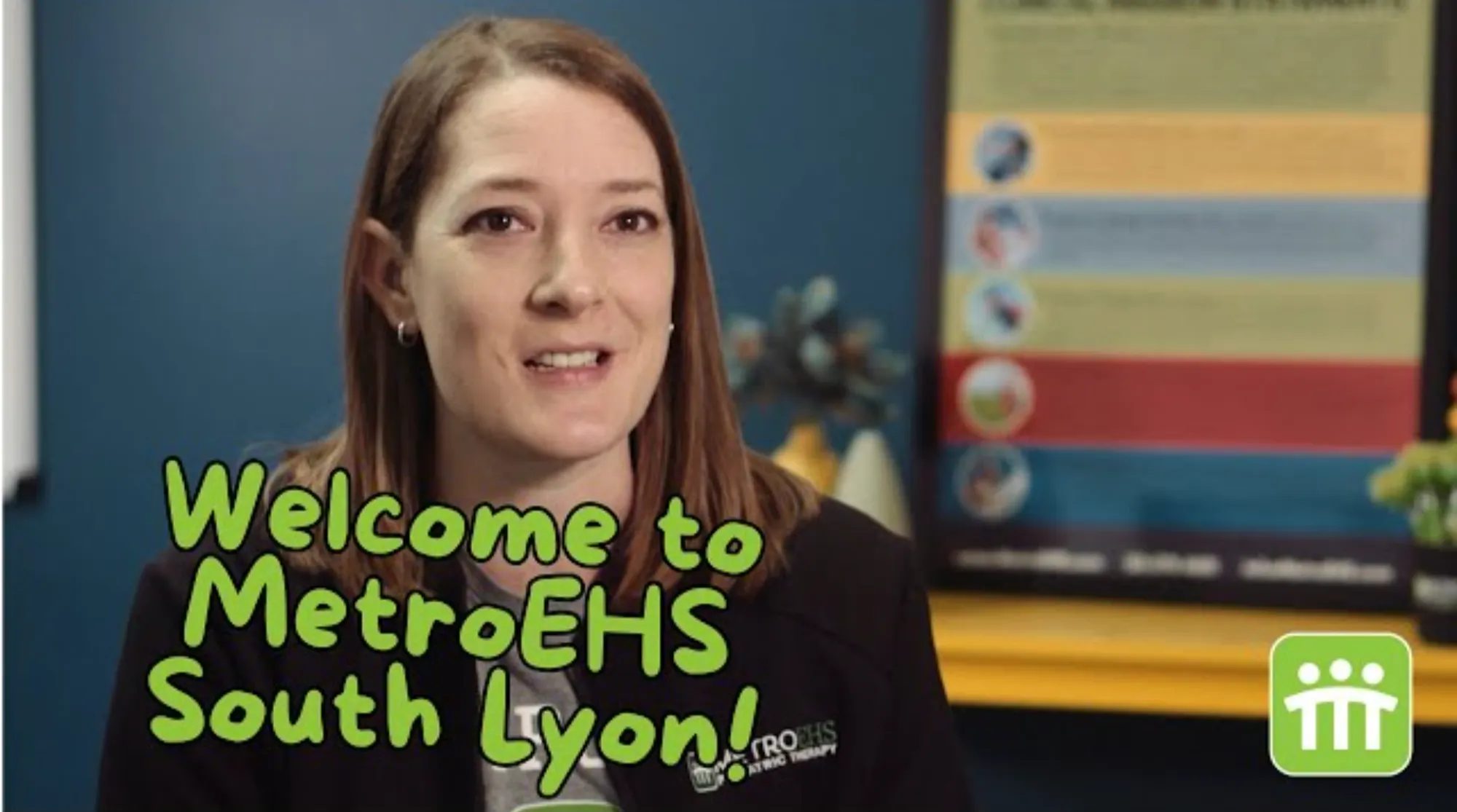 The clinic director sitting facing the camera talking about this MetroEHS clinic and what they do for children