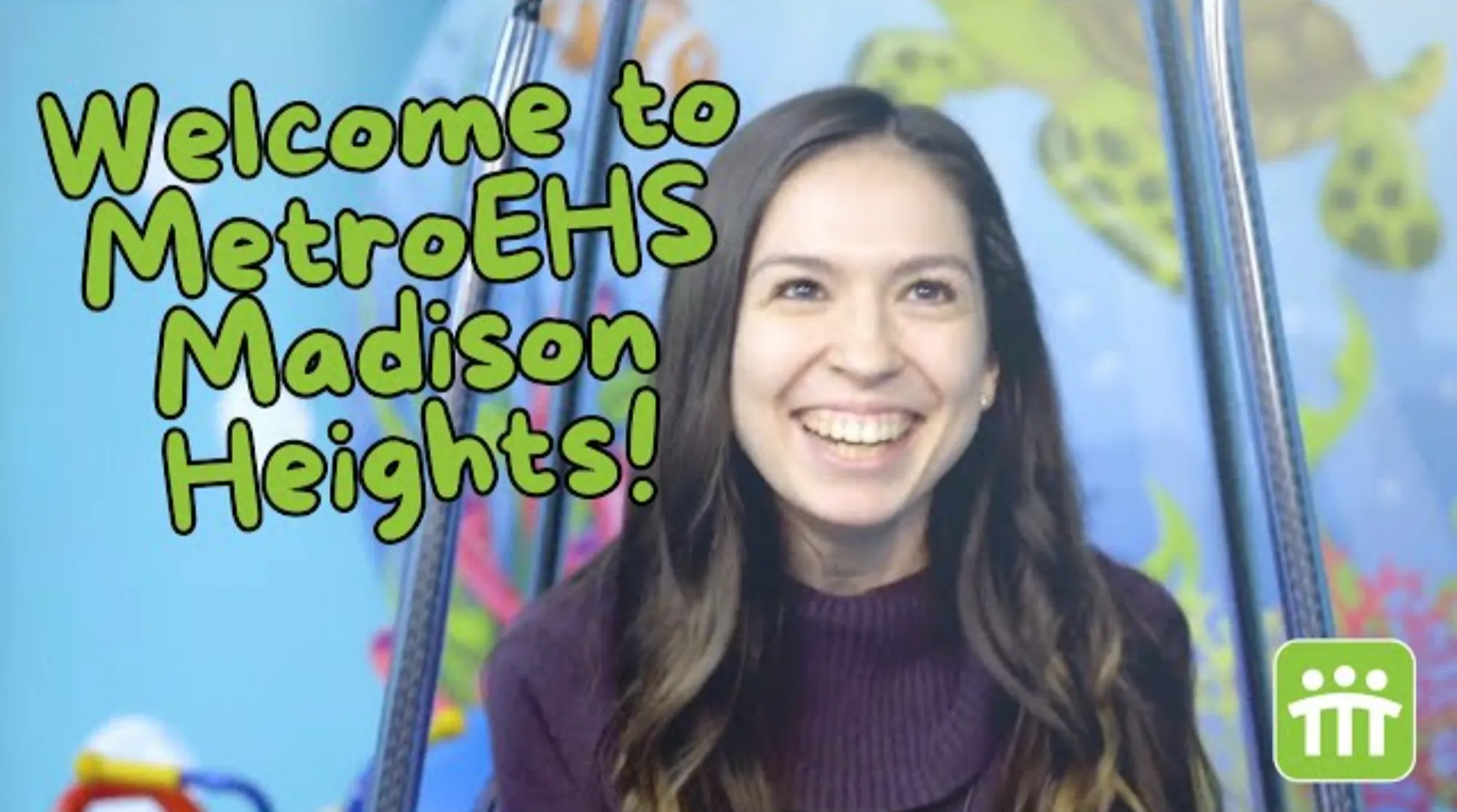 The clinic director sitting facing the camera talking about this MetroEHS clinic and what they do for children