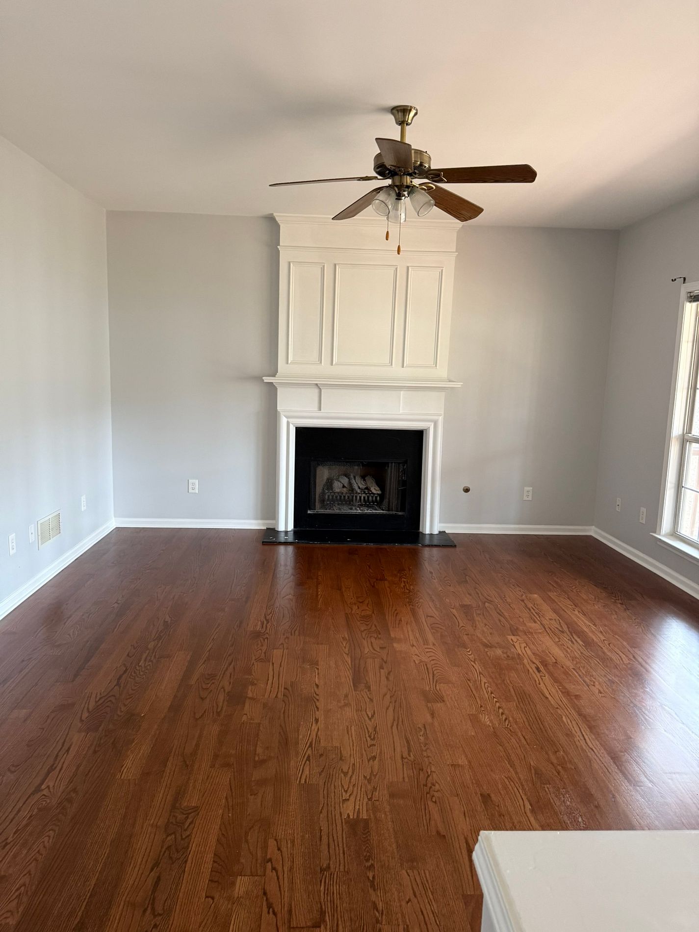 Finished kitchen with stainless appliances and hardwood floors — Cumming, GA restoration