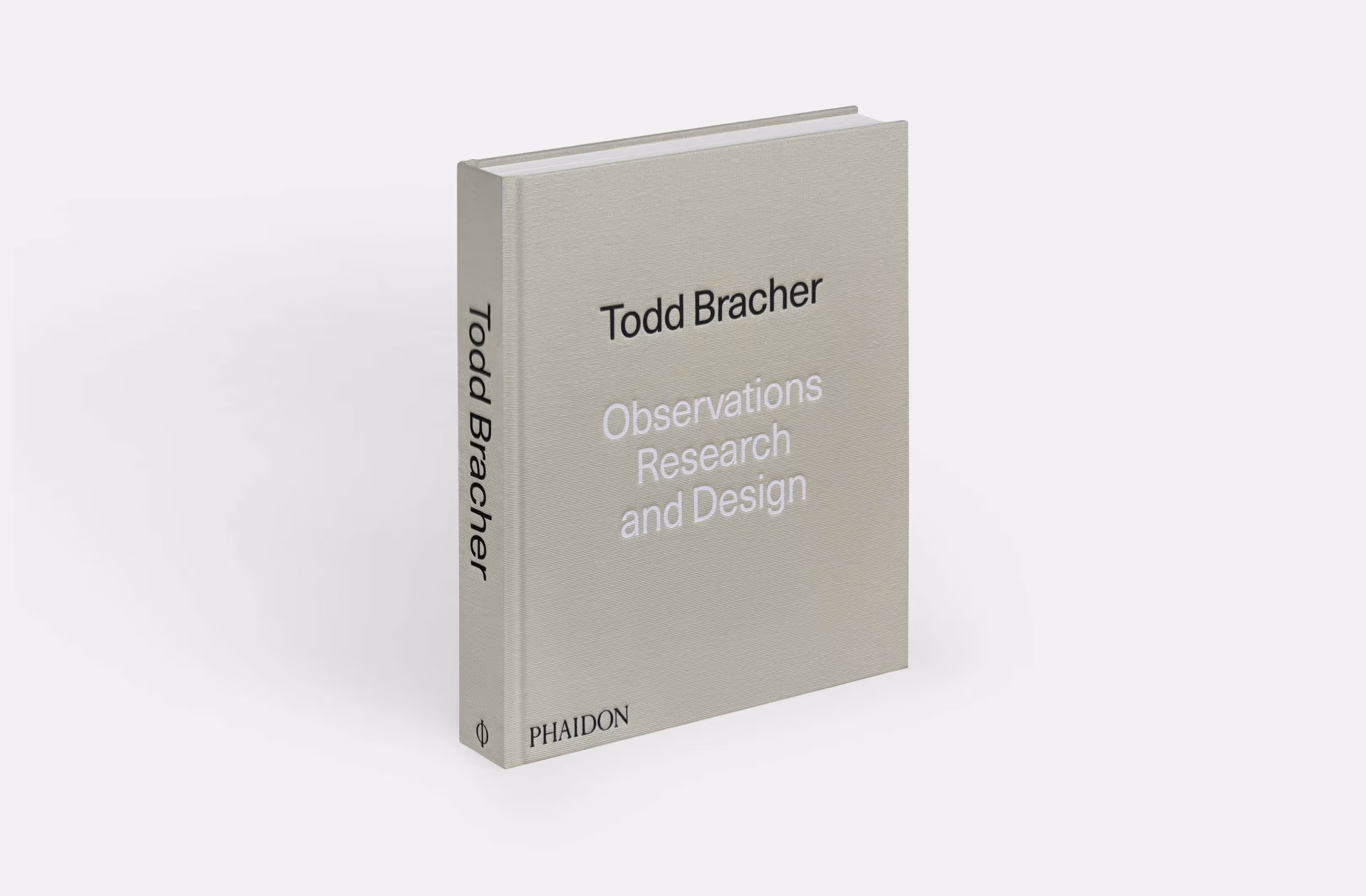 Closed hardcover book titled 'Todd Bracher Observations Research and Design' published by Phaidon, with a beige textured cover.