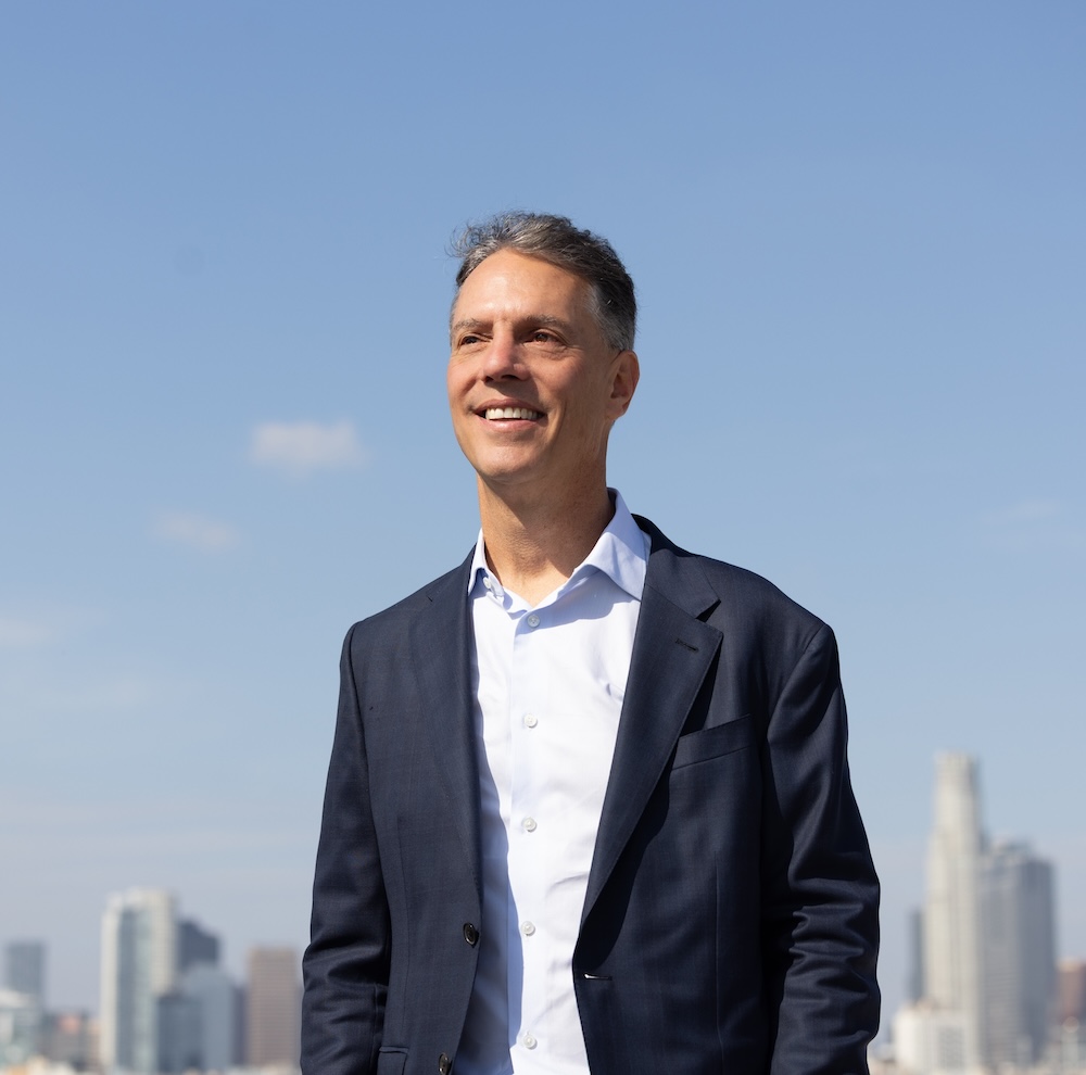 Adam Miller looking out across the city of Los Angeles