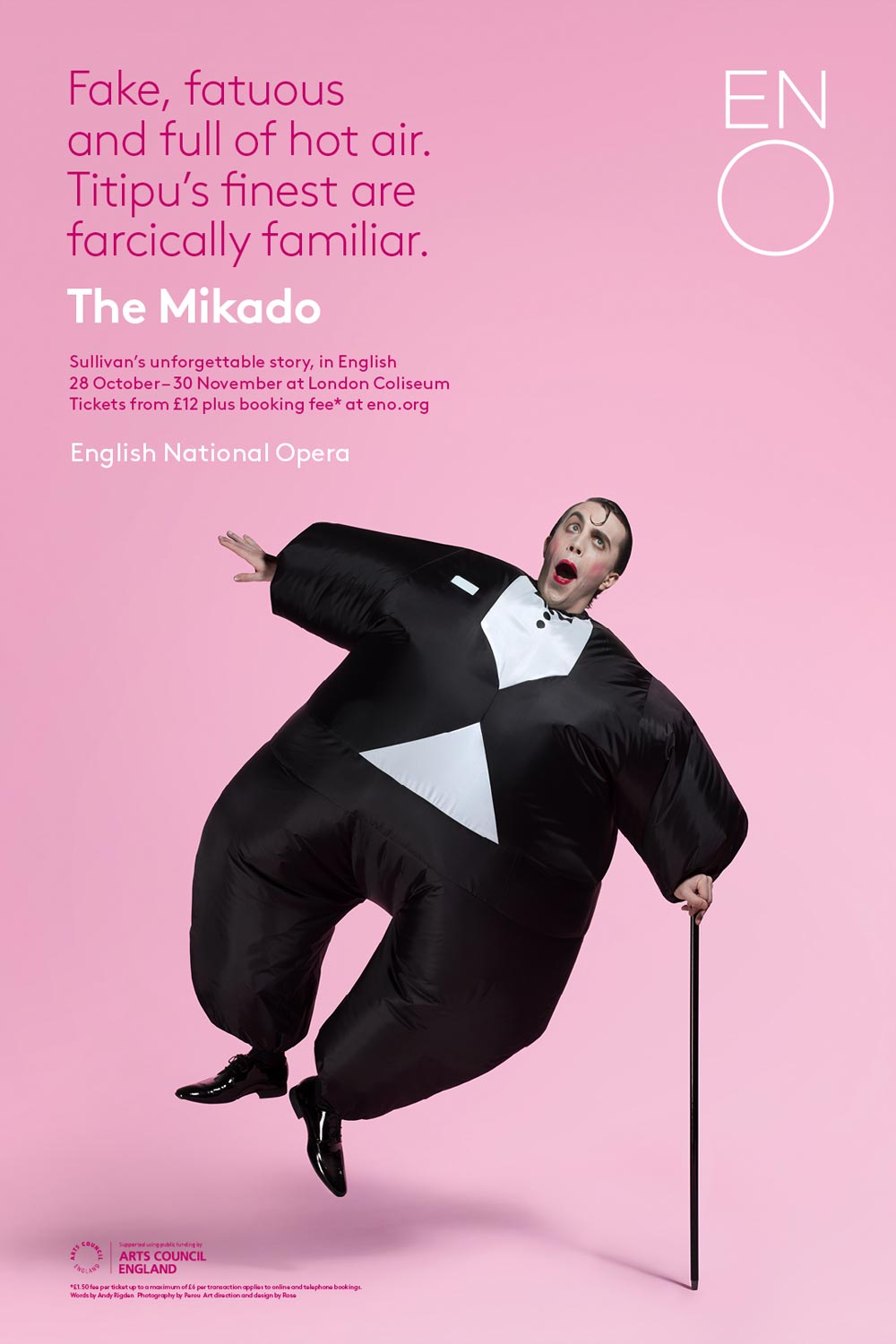 Poster for Sullivan’s Mikado by ENO. A man in an inflated black suit rises off the ground like a balloon.