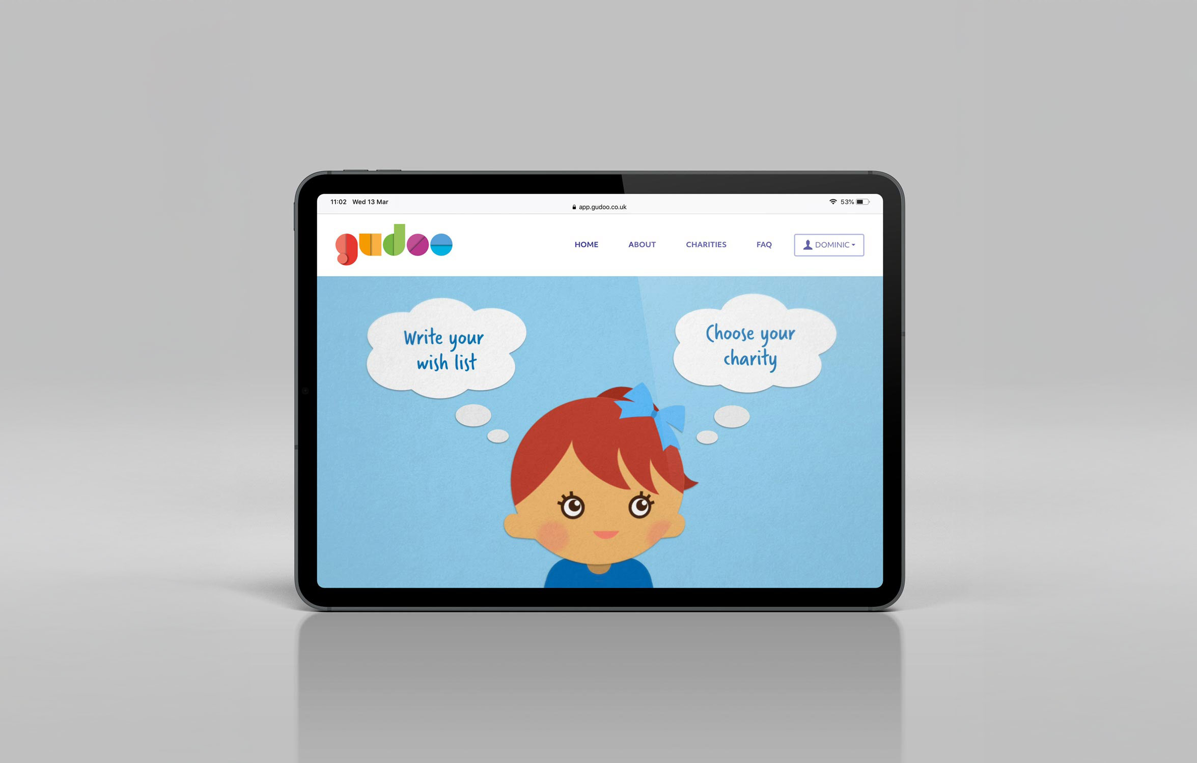 Tablet screen displaying a website with a cartoon girl thinking 'Write your wish list' and 'Choose your charity' in speech bubbles.