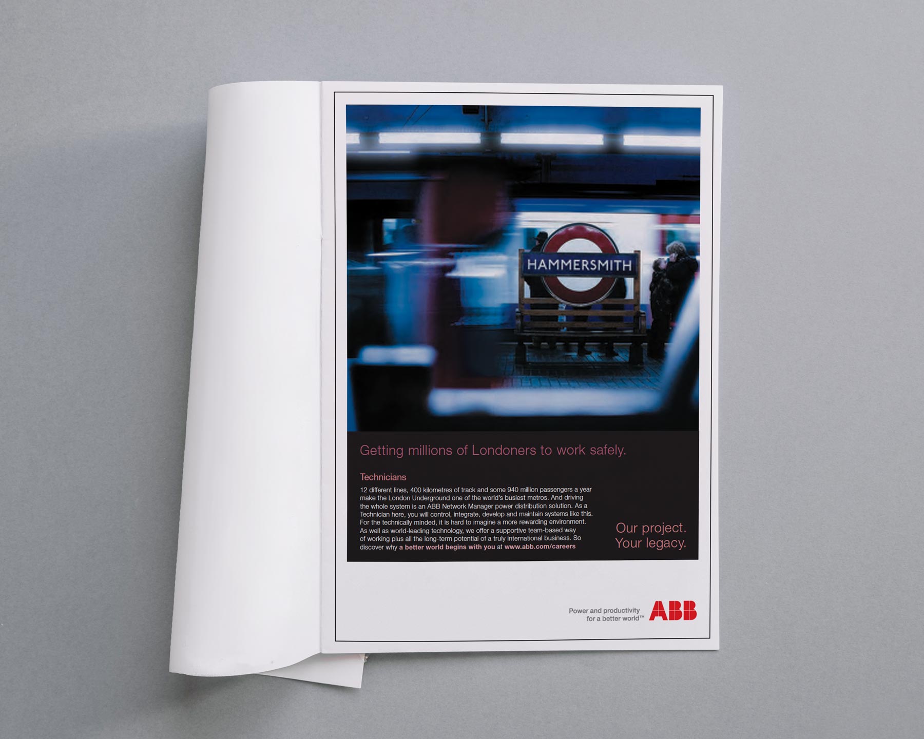 Magazine page with a blurry London Underground station photo featuring the Hammersmith sign and text advertising ABB technician careers.