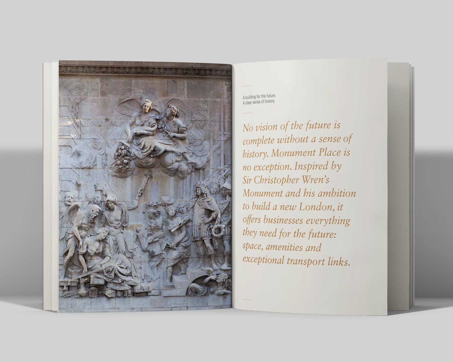 Open book showing a detailed stone relief of historical figures on the left page and text about Monument Place's future vision inspired by Sir Christopher Wren on the right page.