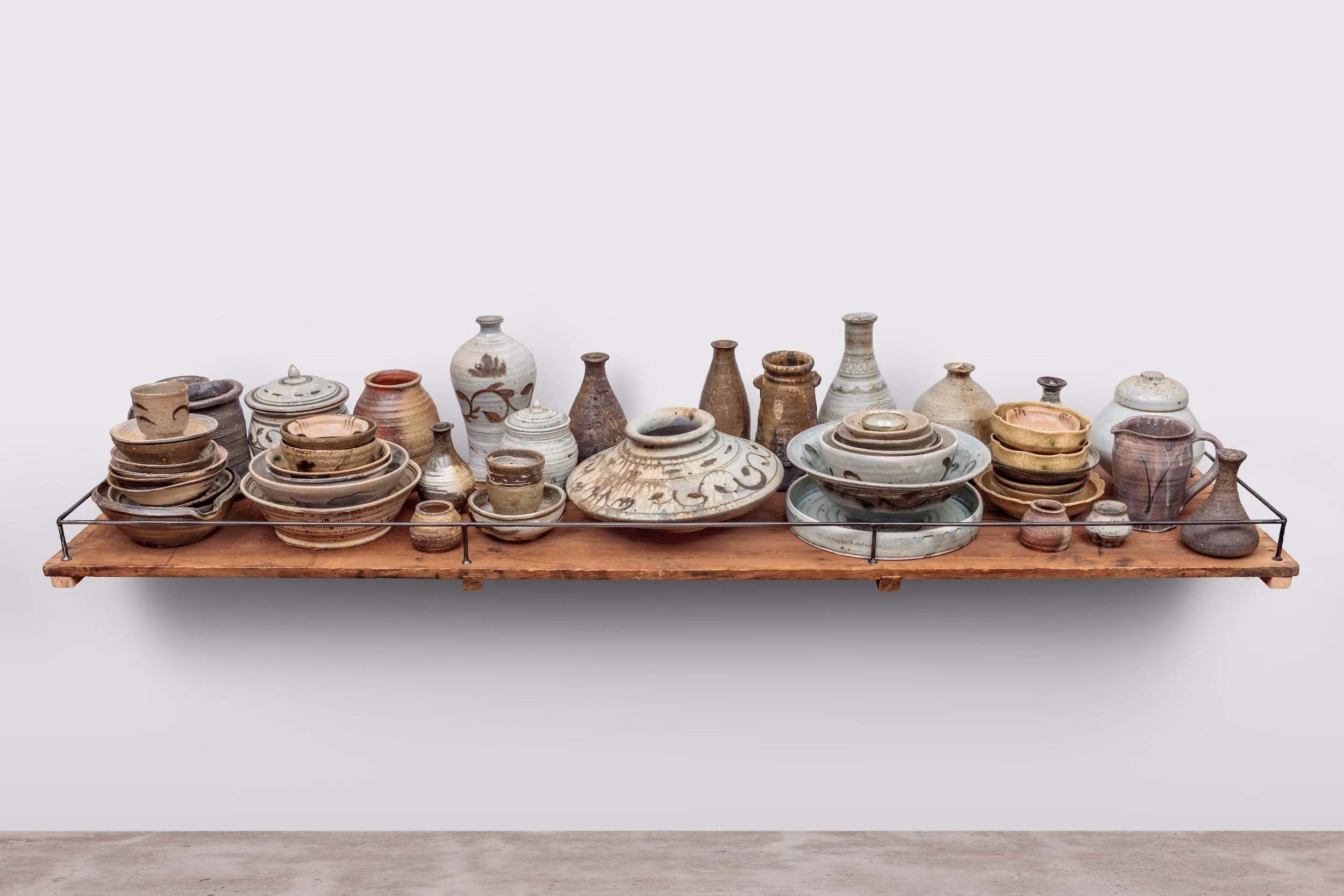 63 Ceramics on Wooden Plank